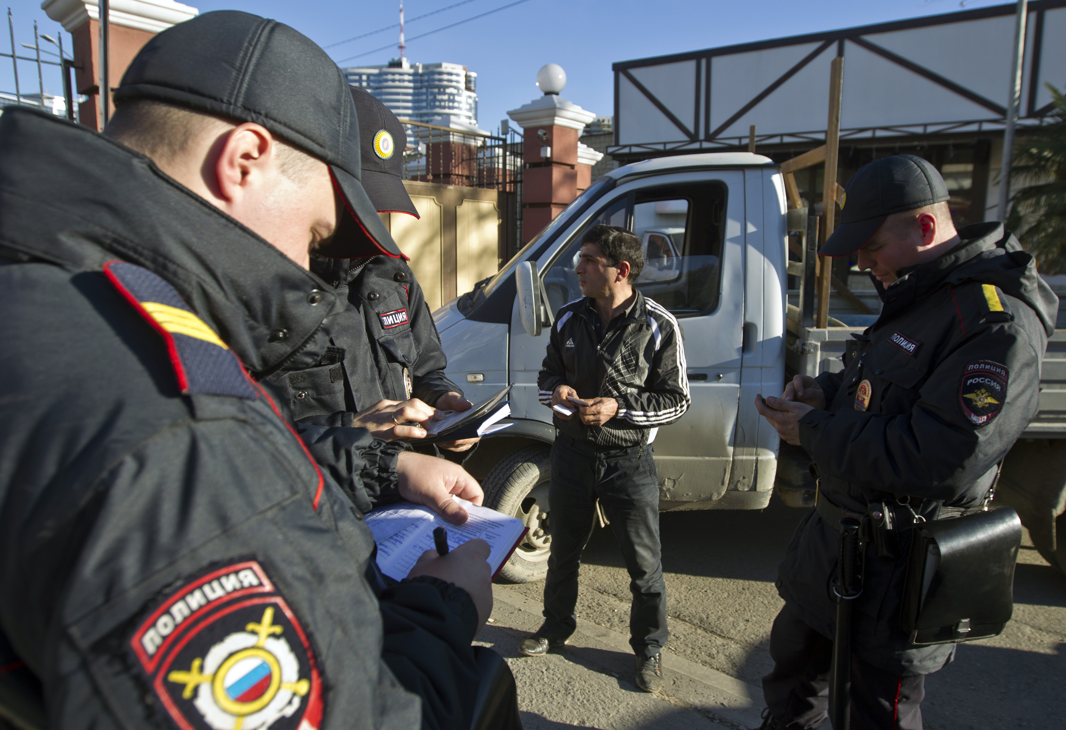 Russian police check a driver's documents in Sochi, 30 December 2013.