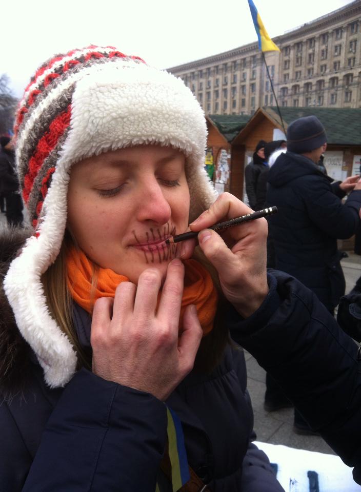 A protester prepares to demonstrate against Law 3879 on 17 January 2014.