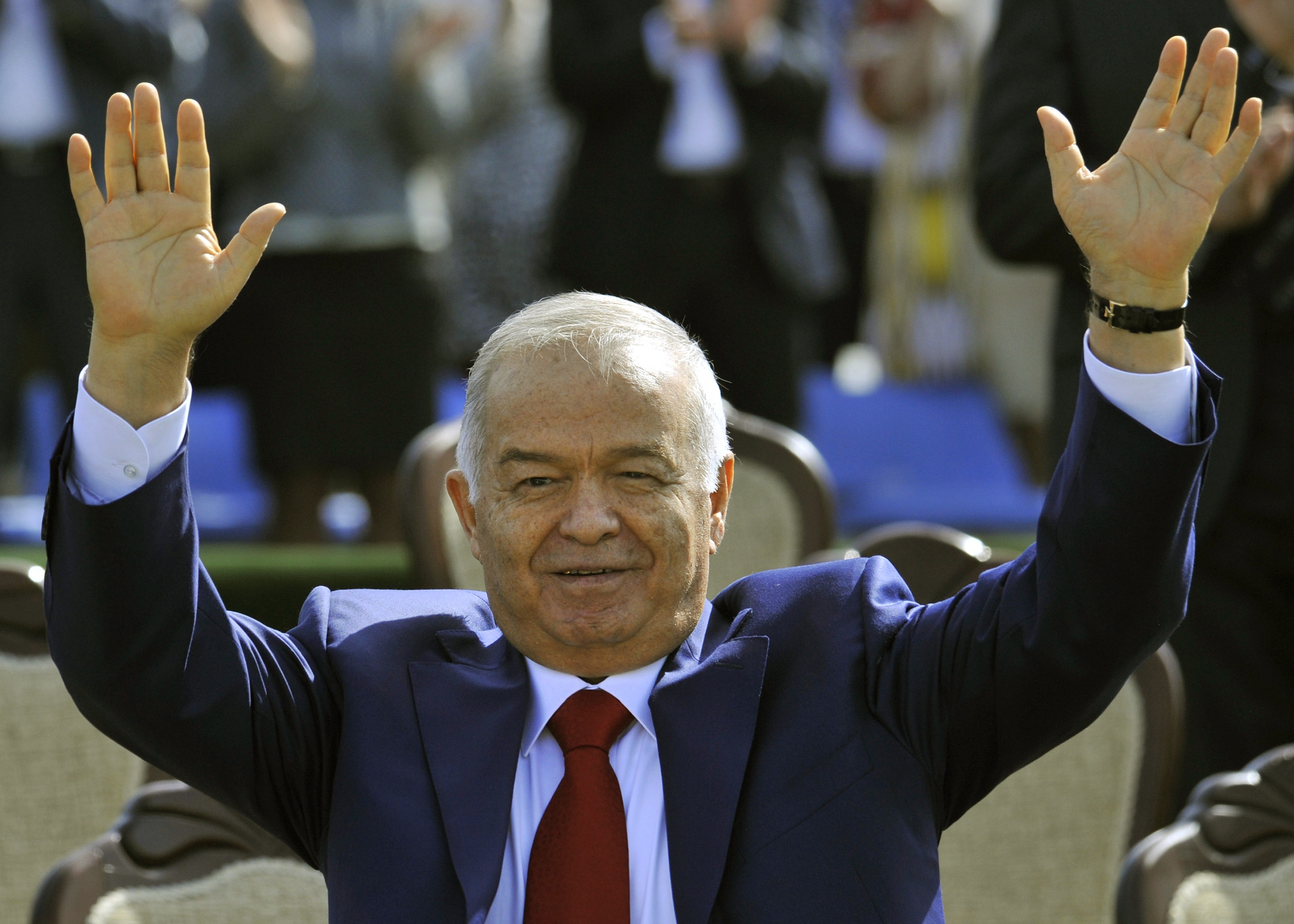 Uzbekistan's President Islam Karimov greets people during the festivities marking the Navruz holiday in Tashkent, Uzbekistan, 21 March 2015.