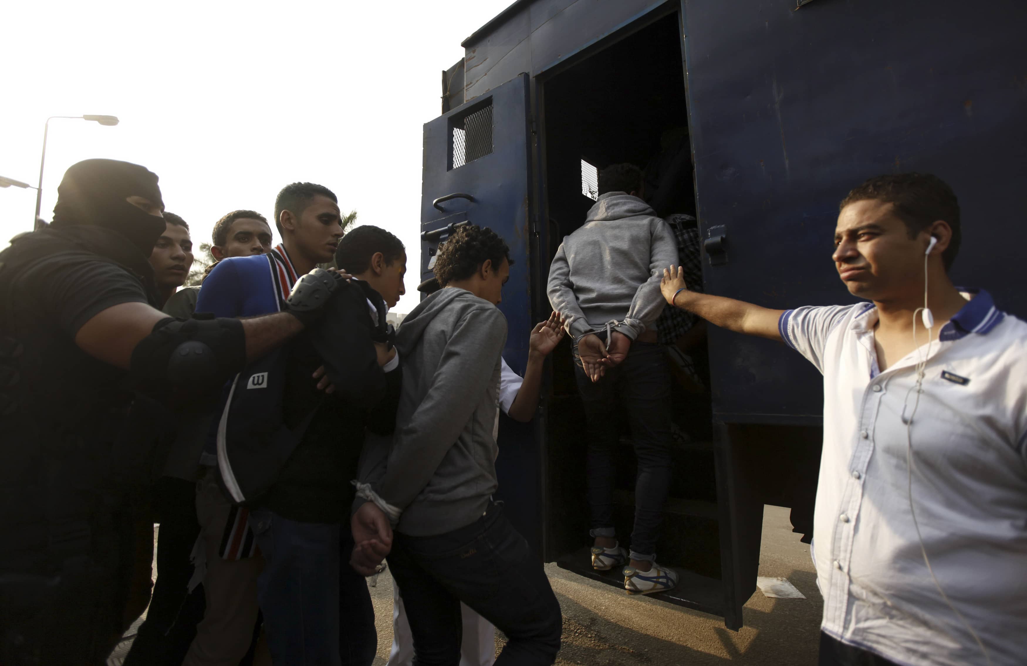 Police detain students in El Azhar university after student protests in Cairo on 30 October 2013, REUTERS/Mohamed Abd El Ghany