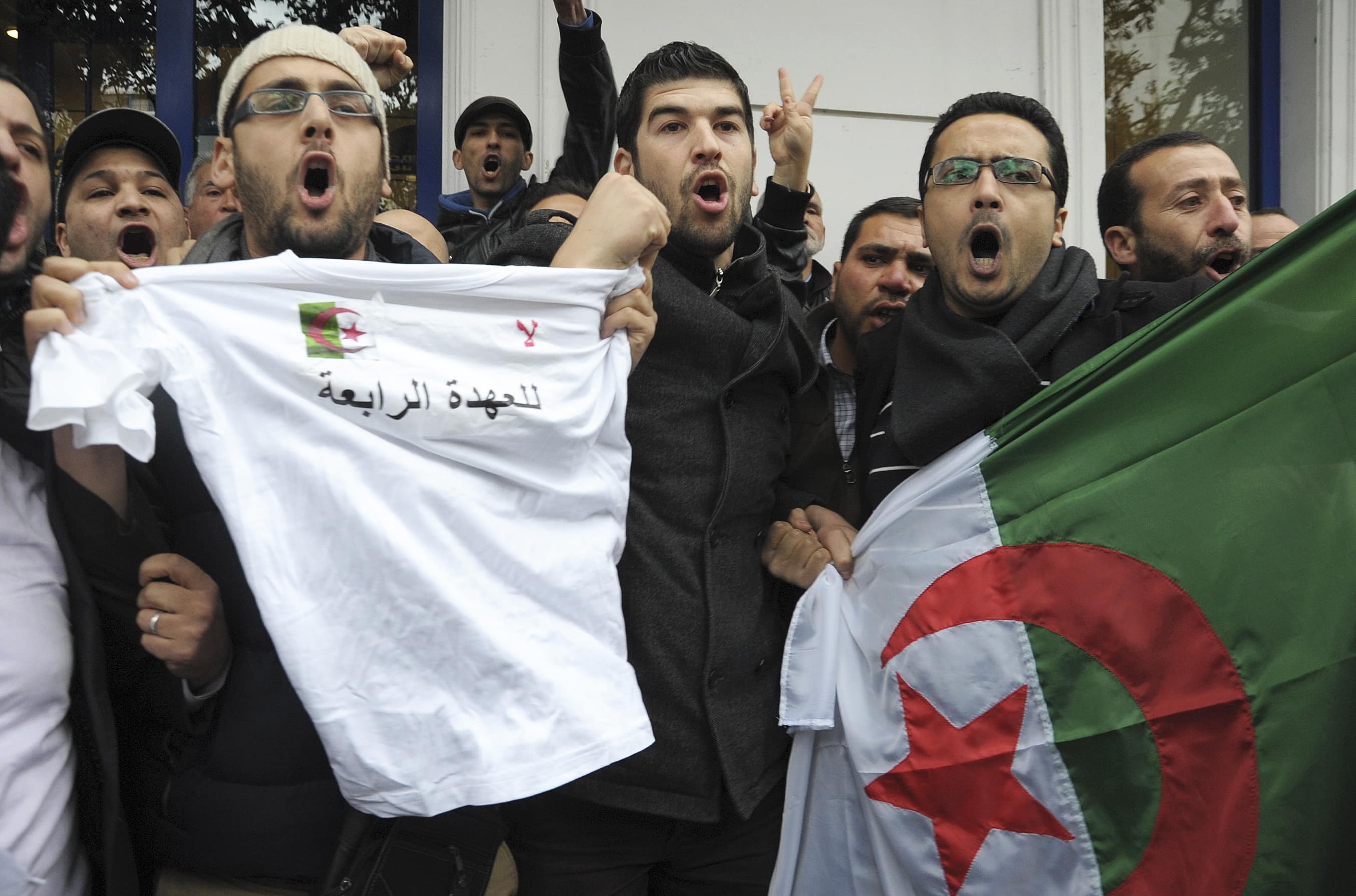 Protesters display shirt with slogan "No to a 4th mandate" during demonstration against President Bouteflika on 1 March 2014, AP Photo/ Sidali Djarboub