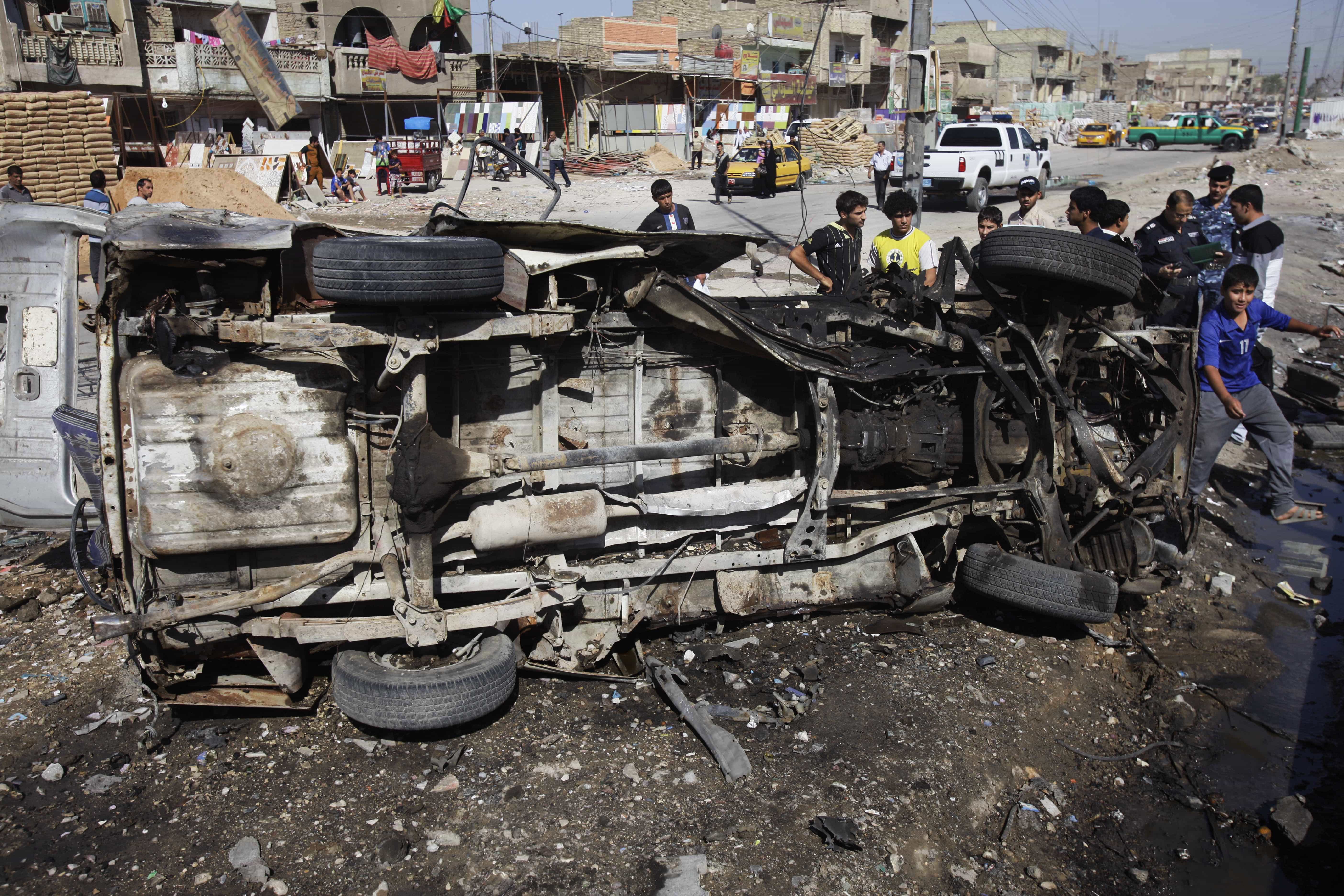 Car bomb attacks in Baghdad are becoming increasingly prevalent leading Iraqis to protest the country's continuing slide into violence, AP Photo/Karim Kadim