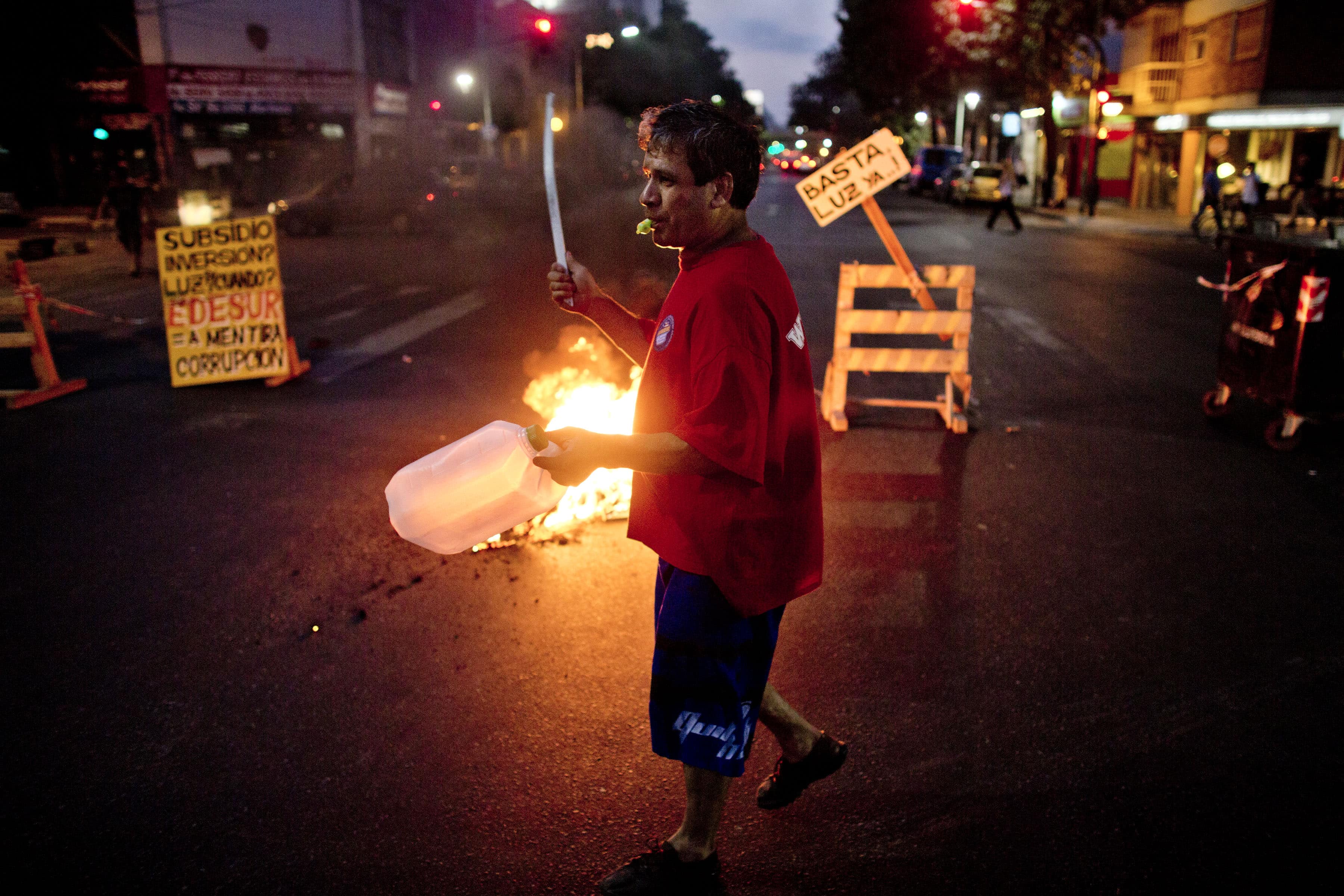 Protests in Buenos Aires and the surrounding areas against prolonged power cuts have seen demonstrators and journalists mistreated by security forces, AP Photo/Victor R. Caivano