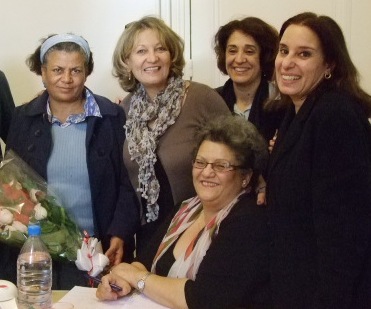 The women of ATFD with flowers from the IFEX-TMG on 10 December