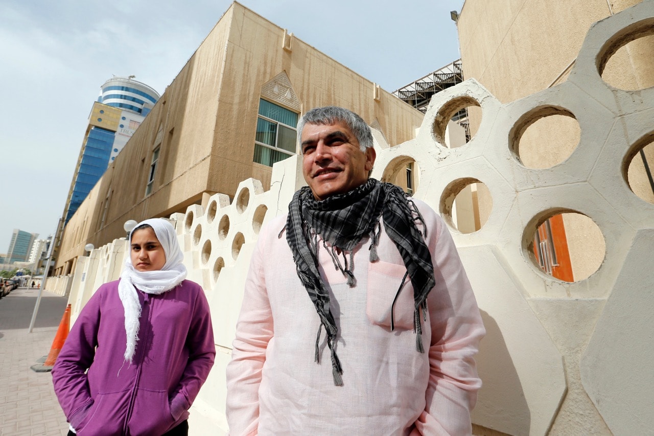 Bahraini human rights activist Nabeel Rajab (R) walks with his daughter Malak Rajab to attend his appeal hearing at court in Manama, 11 February 2015, REUTERS/Hamad Mohammed