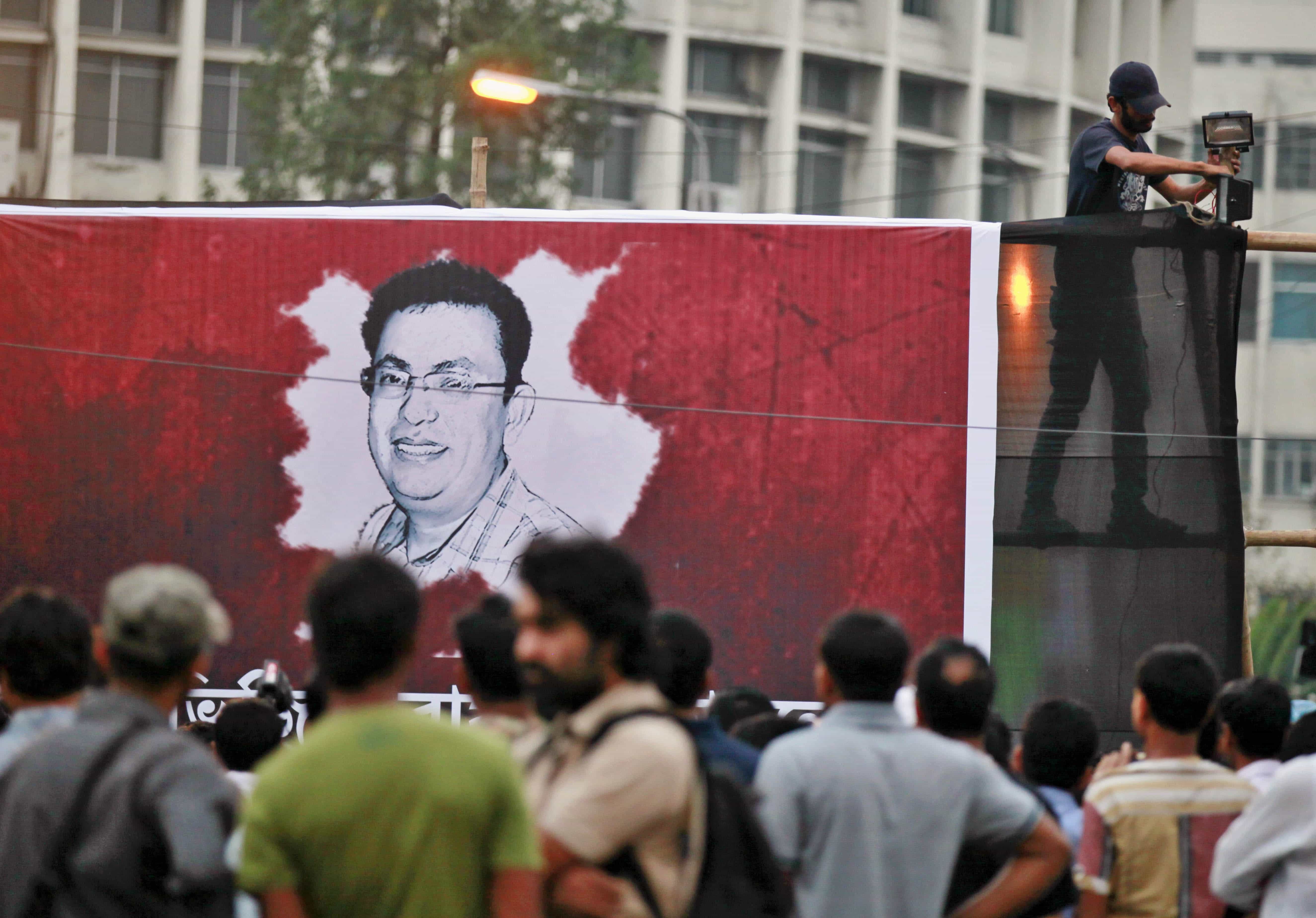 People gather during a protest against the murder of blogger Avijit Roy in Dhaka, Bangladesh, Friday, Feb. 27, 2015, AP Photo/A.M. Ahad