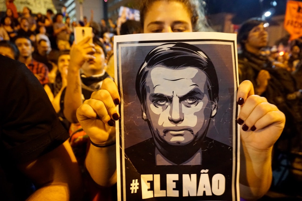 Students attend a demonstration against Brazil's president-elect Jair Bolsonaro in Sao Paulo, 30 October 2018; the sign reads #NotHim in reference to Bolsonaro, Cris Faga/NurPhoto via Getty Images