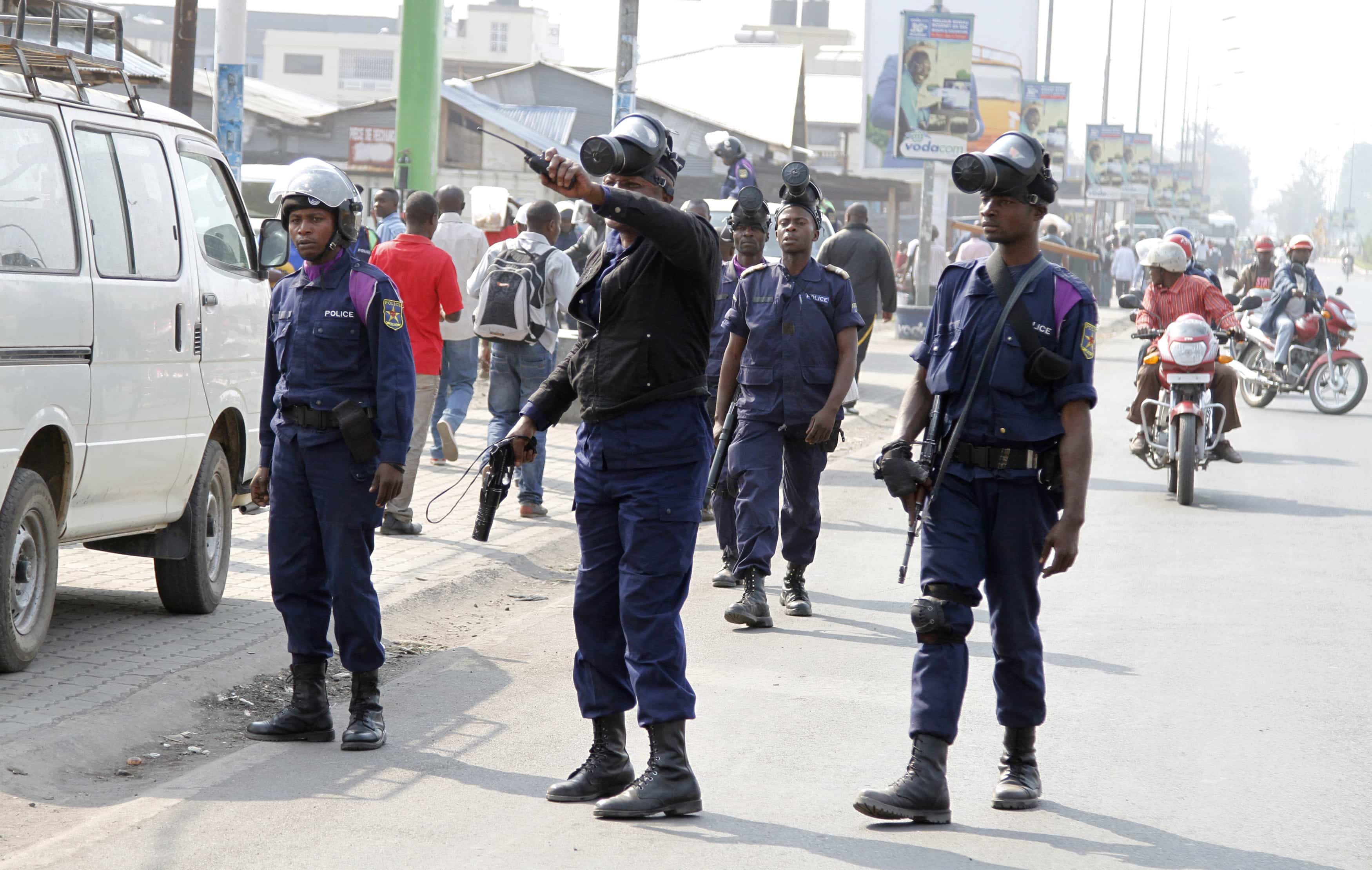 Riot policemen patrol along a street during a nation-wide protest in Goma, DRC, 19 January 2015, REUTERS/Kenny Katombe