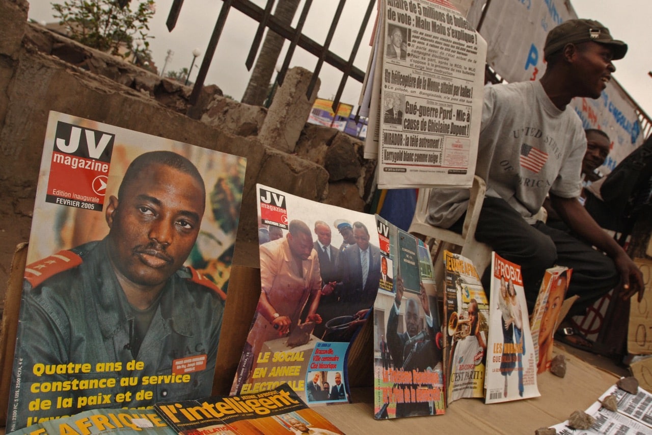 A photo of President Joseph Kabila is seen on a magazine stand, in Kinshasa, Democratic Republic of Congo, 7 July 2006, LIONEL HEALING/AFP/Getty Images