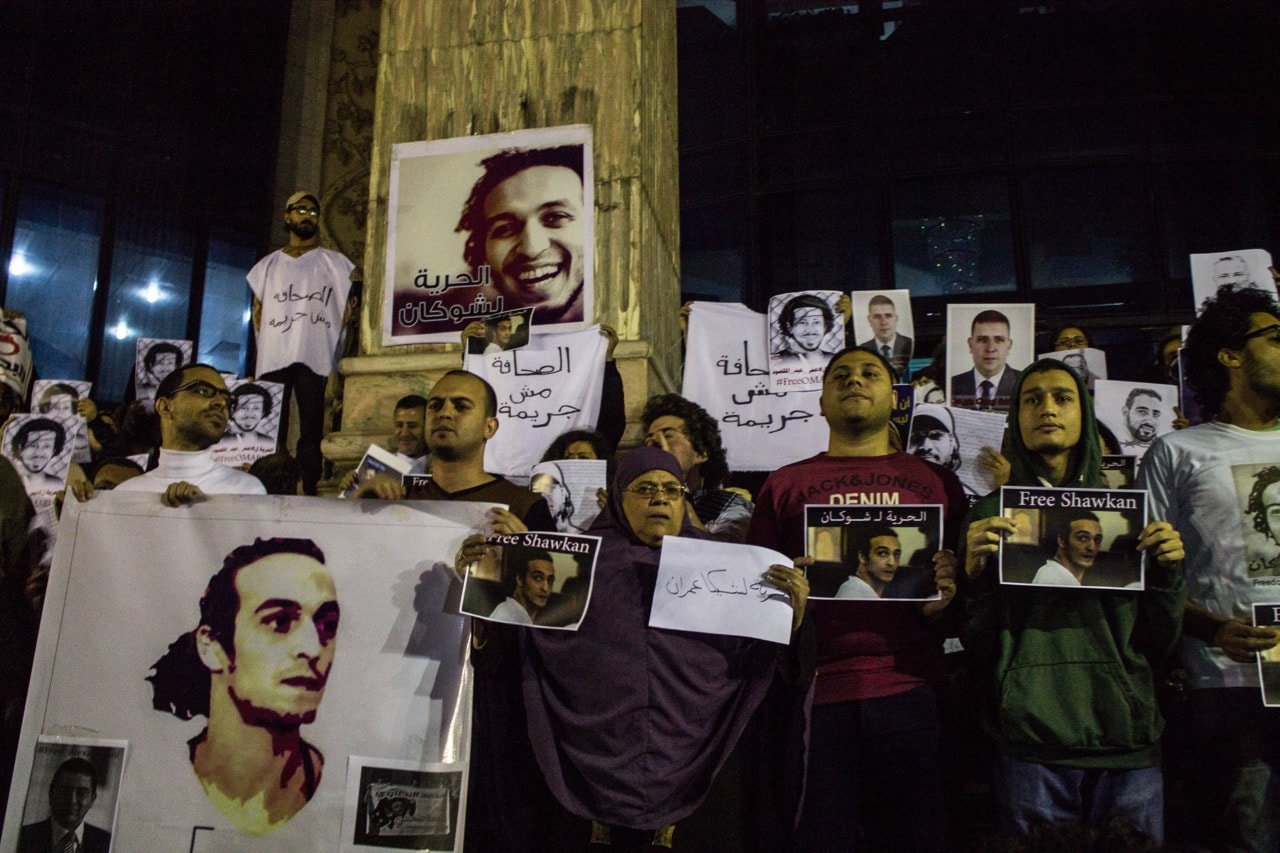 A group of journalists and activists calls for the release of Shawkan and other jailed journalists, in front of the Press Syndicate in Cairo, Egypt, 9 December 2015, NurPhoto/NurPhoto via Getty Images
