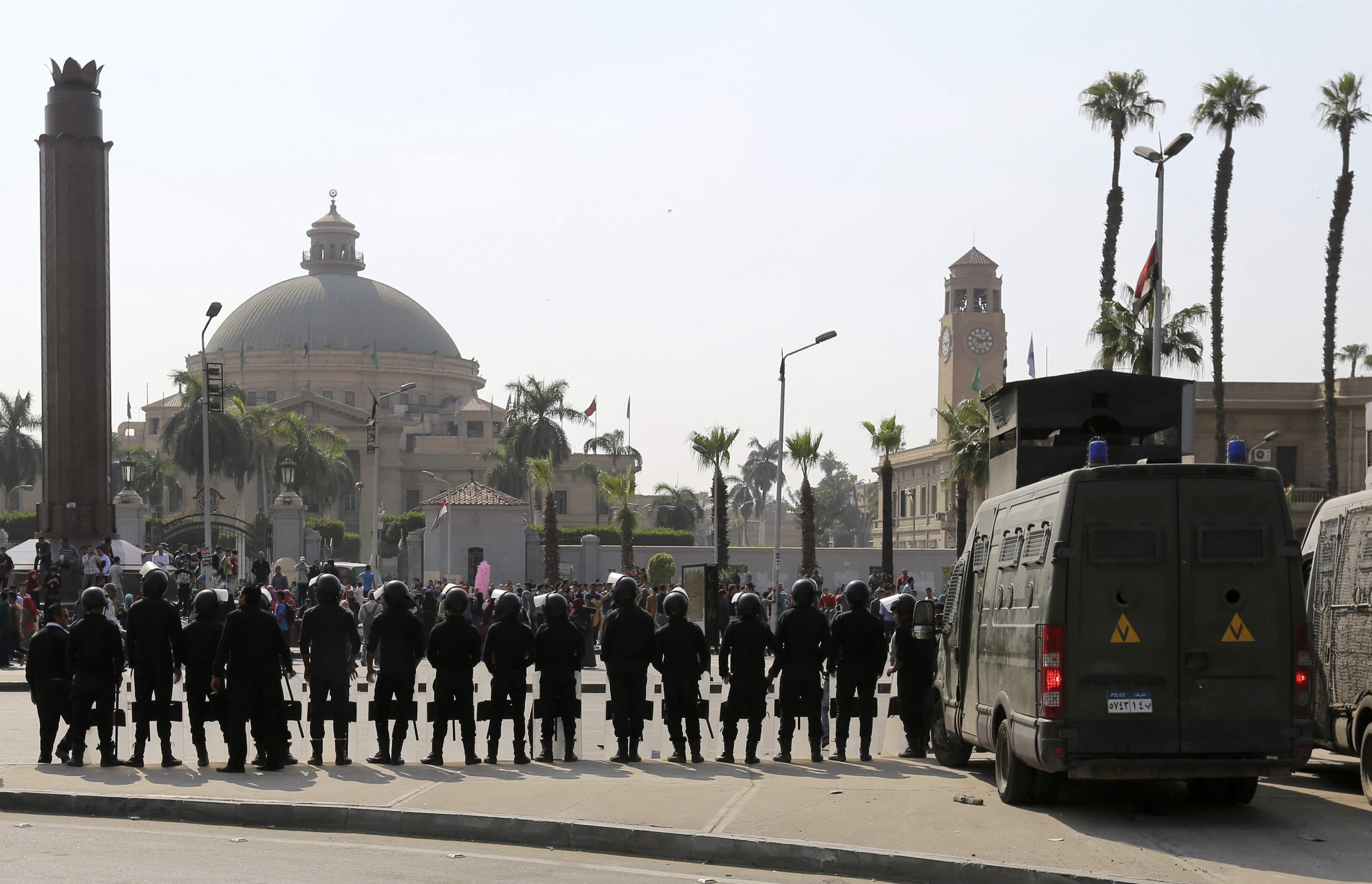 Riot police officers take positions in front of Cairo University, as students who are supporters of the Muslim Brotherhood and deposed President Mohamed Morsi, plan a protest , REUTERS/Mohamed Abd El Ghany