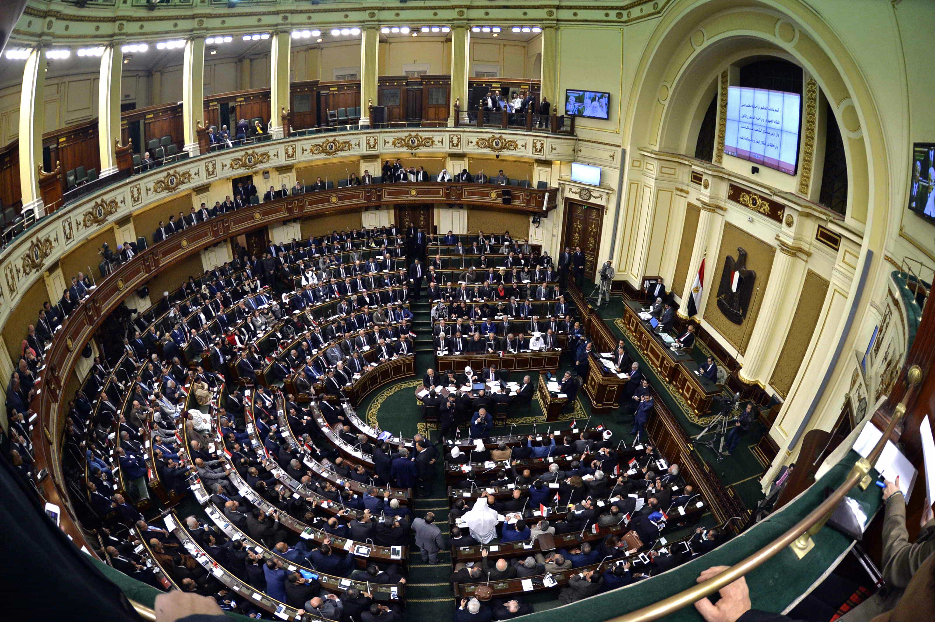 In this Sunday, Jan. 10, 2016 file photo, members of Egypt's Parliament attend the inaugural session, the first to convene in three years, in Cairo, Egypt, (AP Photo/Said Shahat, File)