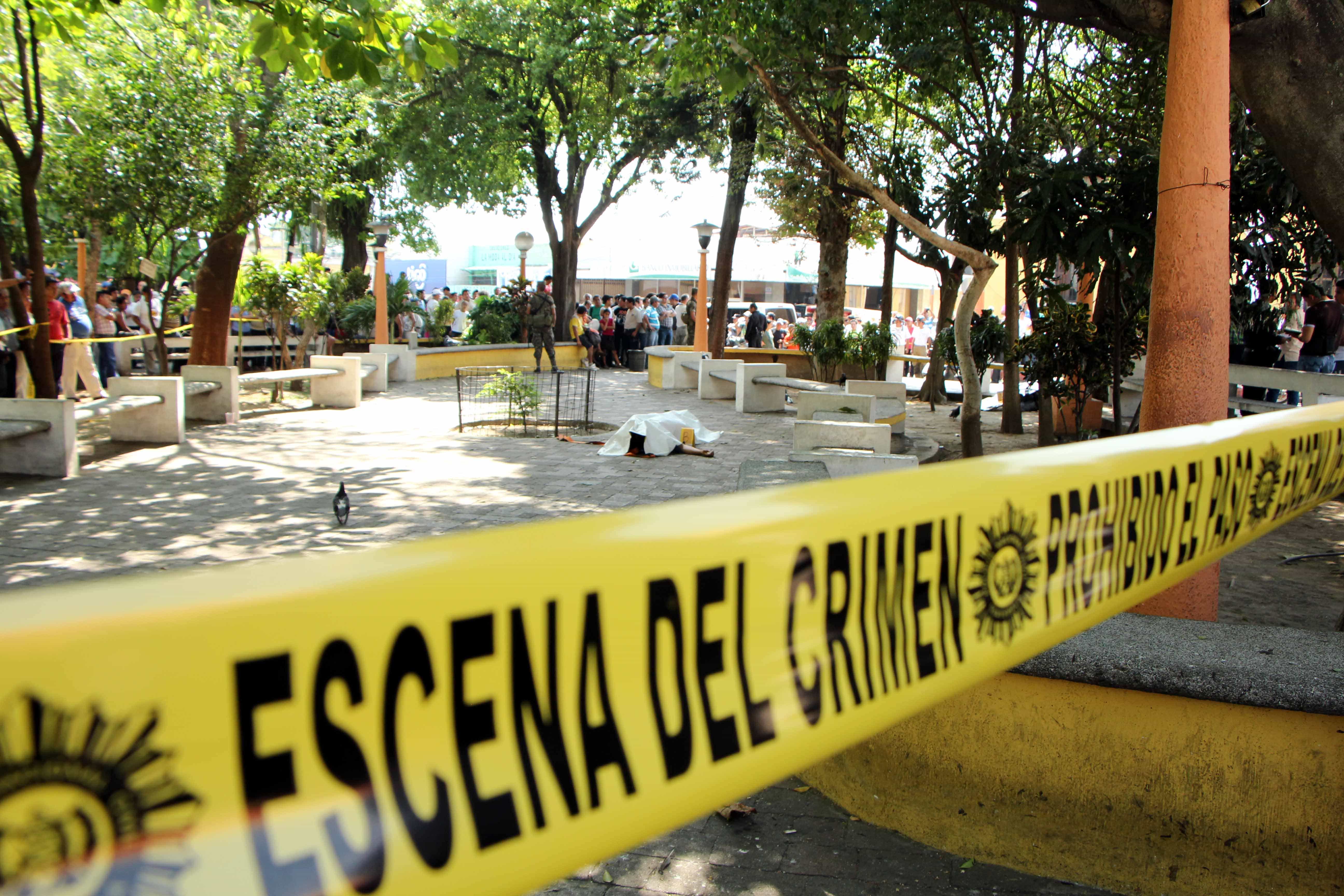 Crime scene tape in the central park of Mazatenango, Guatemala, where Federico Salazar and Danilo López were killed on 10 March 2015, AP Photo/Prensa Libre