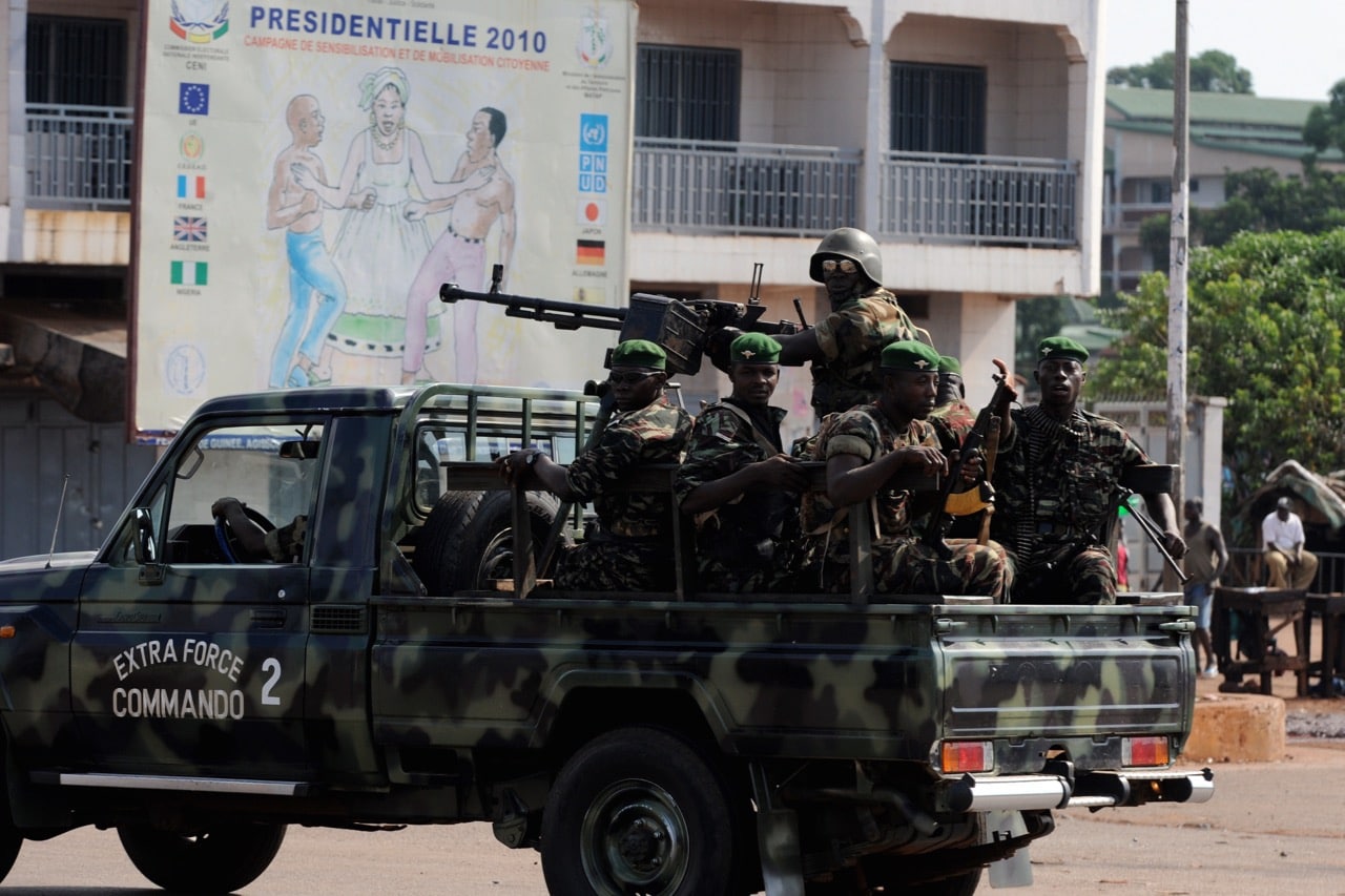 Guinea's army patrol in Ratoma, a suburb of Conakry, 18 November 2010, ISSOUF SANOGO/AFP/Getty Images