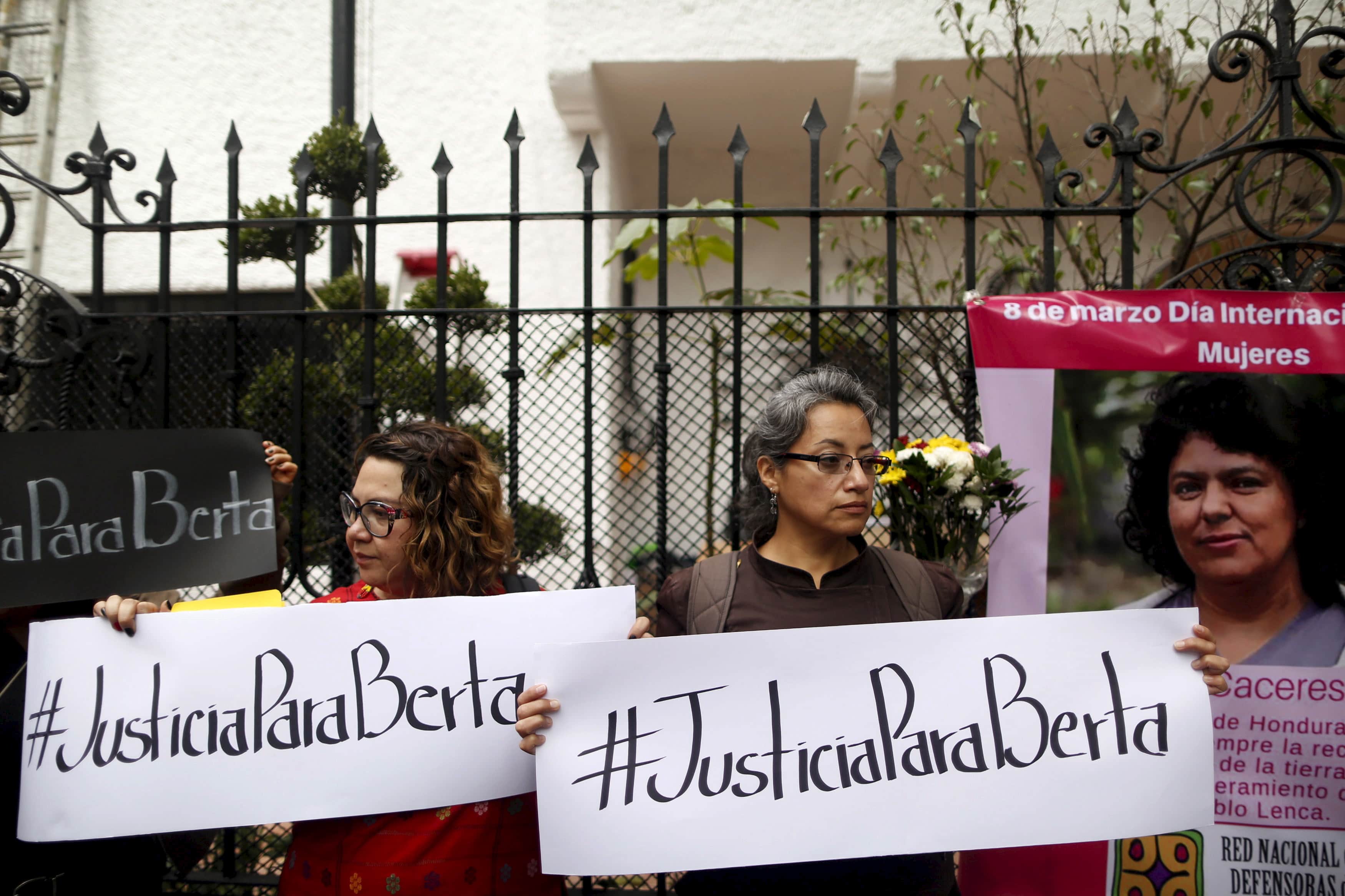 Activists hold signs that read "#Justice for Berta" to protest against the murder of environmental rights activist Berta Cáceres, outside the Embassy of Honduras in Mexico City, REUTERS/Edgard Garrido