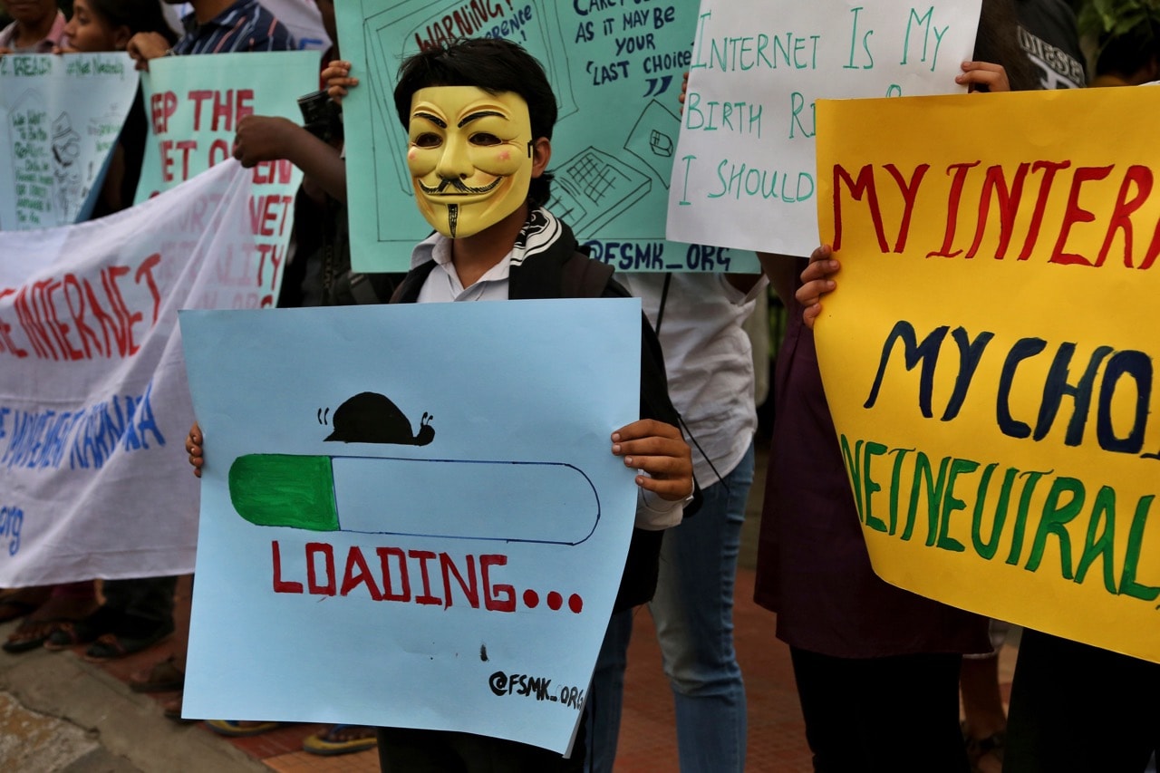 An activist takes part in a demonstration supporting net neutrality, in Bangalore, India, 23 April 2015, AP Photo/Aijaz Rahi