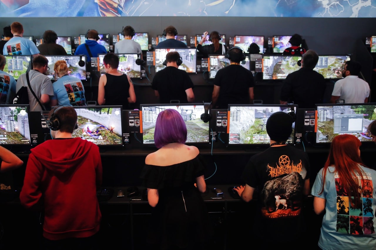 Gamers play video games during the opening of the world's largest computer games fair Gamescom in Cologne, Germany, 22 August 2017, REUTERS/Wolfgang Rattay