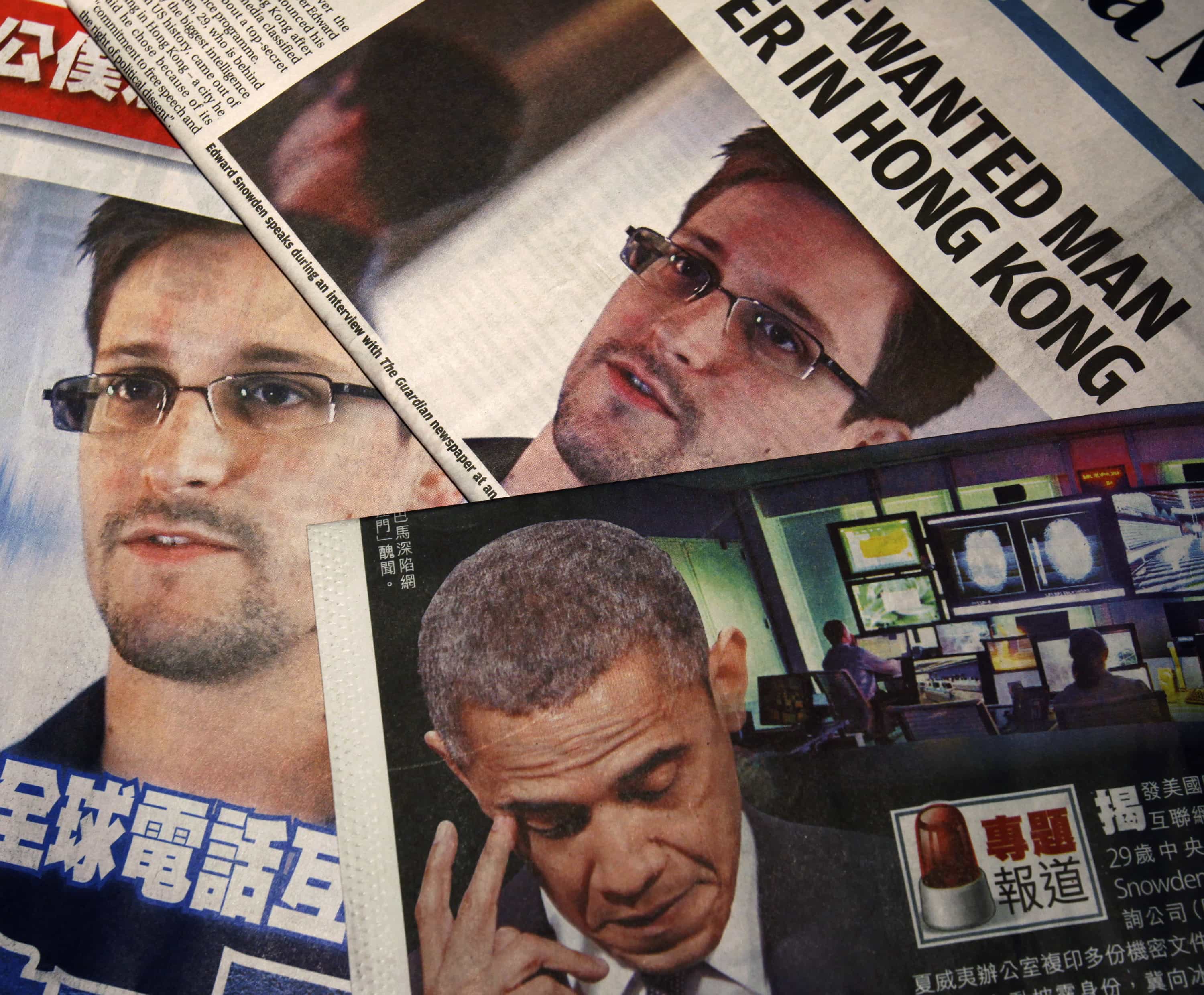Photos of Edward Snowden and U.S. President Barack Obama are printed on the front pages of local English and Chinese newspapers in Hong Kong, 11 June 2013, REUTERS/Bobby Yip