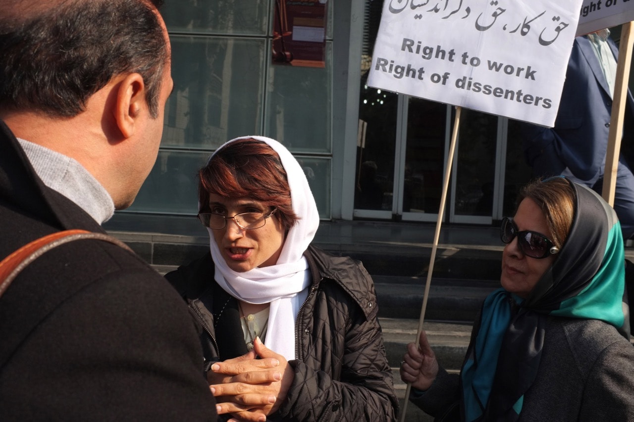 Human rights lawyer Nasrin Sotoudeh talks to supporters outside the bar association during her daily sit-in protesting a decision banning her from law practice, in Tehran, Iran, 14 December 2014, Kaveh Kazemi/Getty Images