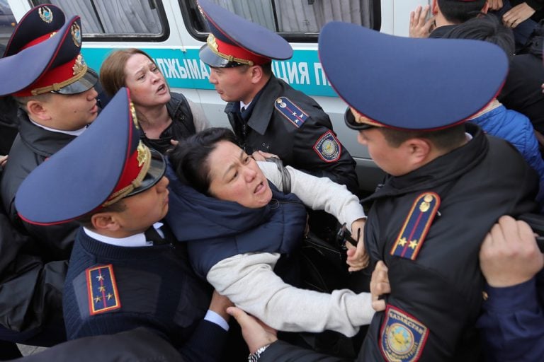 Police officers detain anti-government protesters during a rally in Almaty, Kazakhstan, 22 March 2019, REUTERS/Pavel Mikheyev