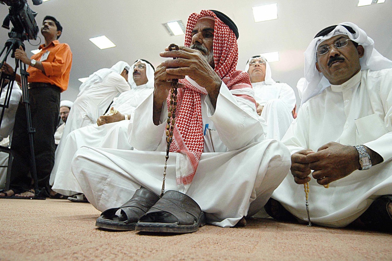 Bedoon men attend a seminar hosted by the Kuwait Human Rights Association to talk about the suffering of tens of thousands of stateless Arabs known as 'bidoon', in Kuwait City, 4 November 2006, YASSER AL-ZAYYAT/AFP/Getty Images