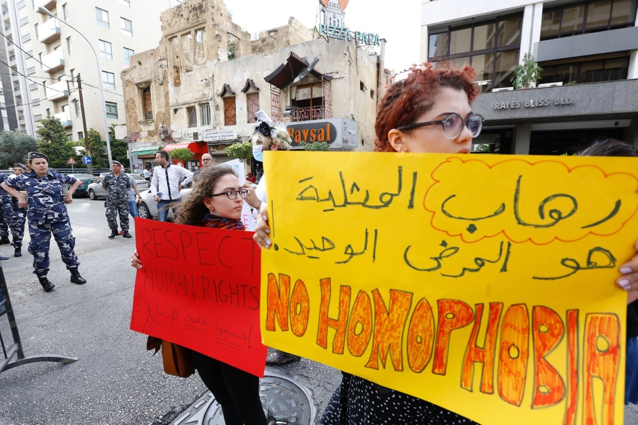 Activists from the Lebanese LGBT community take part in a protest outside the Hbeish police station in Beirut, 15 May 2016, ANWAR AMRO/AFP/Getty Images