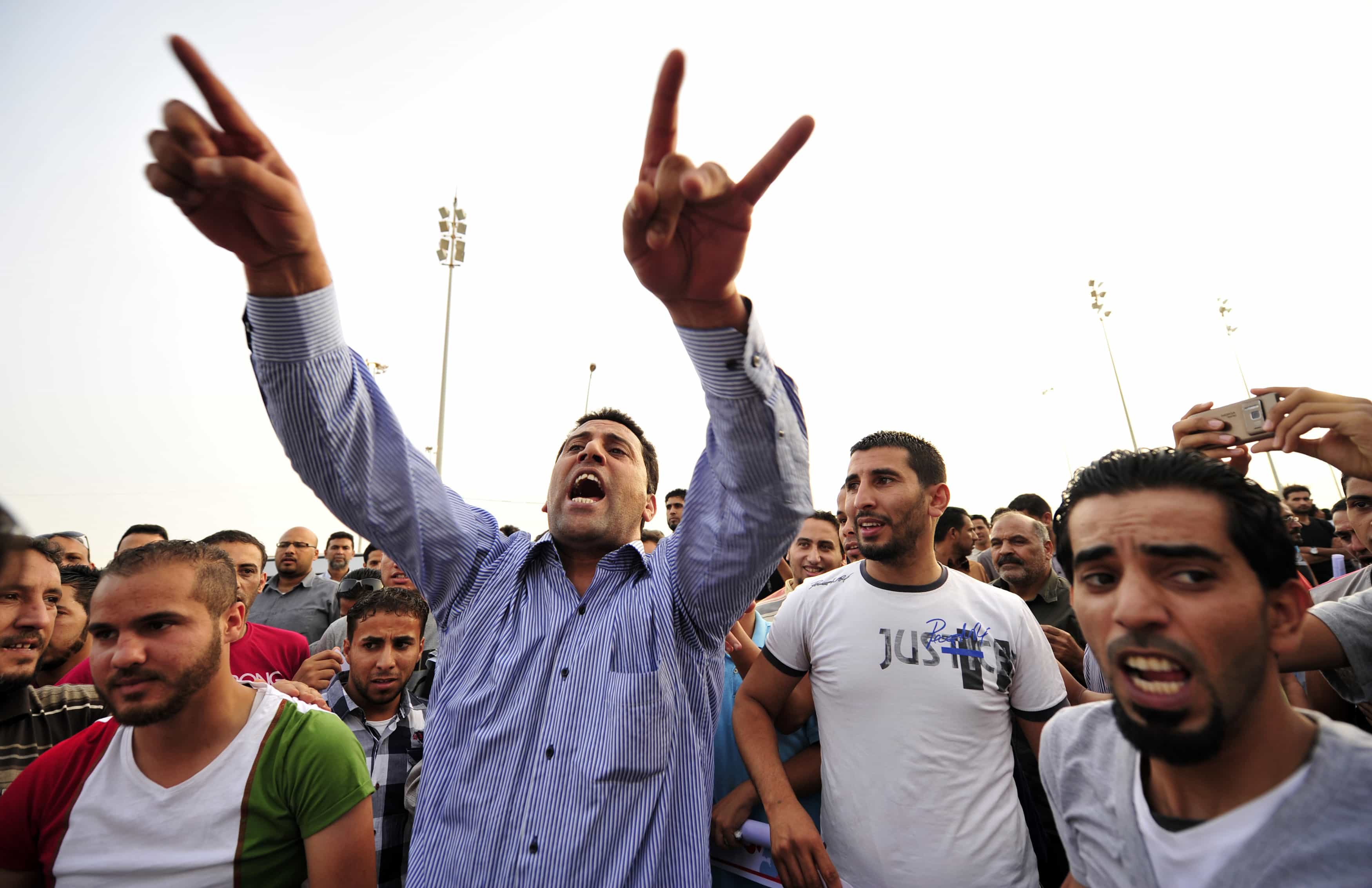 People demonstrate to demand the country's National Congress and transitional government to ensure the police and the army carry out their jobs, and that militias are dismantled, in Benghazi on 17 May 2013, REUTERS/Esam Al-Fetori