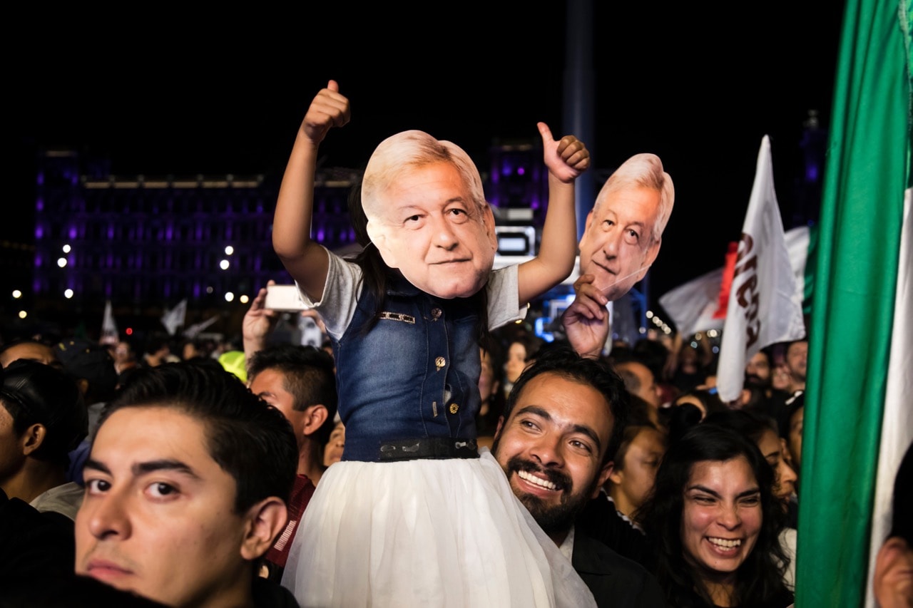 AMLO supporters celebrate the victory of Andres Manuel López Obrador in the main square in Mexico City, Mexico, 1 July 2018, Vincent Isore/IP3/Getty Images