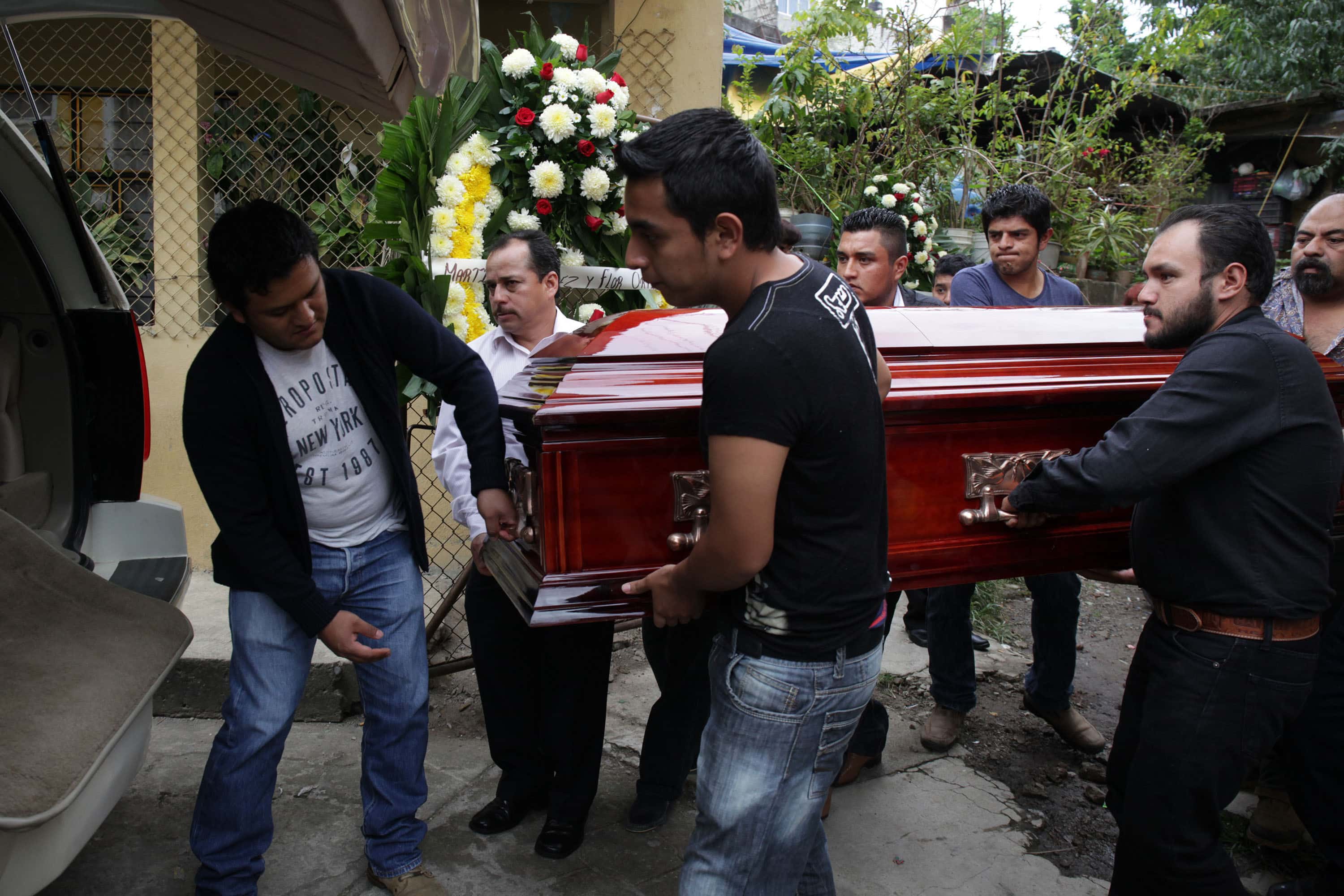 Pallbearers carrying a casket at the funeral of assassinated journalist Aurelio Campos Contreras in Huauchinango, México, 16 September 2016 , AP Photo/Pablo Spencer