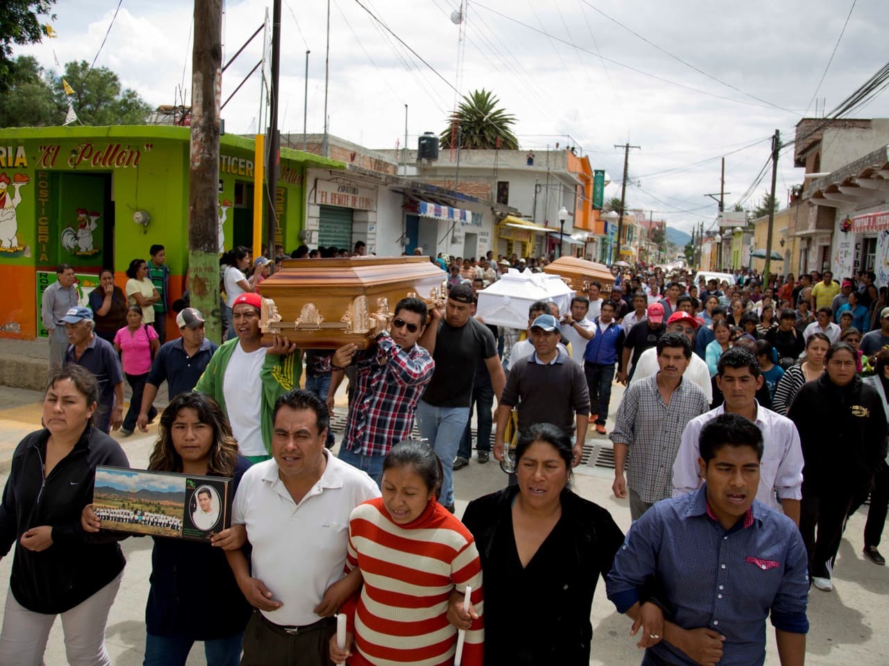 Procession in Nochixtlan Oaxaca, 20 June 2016; 6 people were killed in disturbances in this city, AP Photo/Eduardo Verdugo
