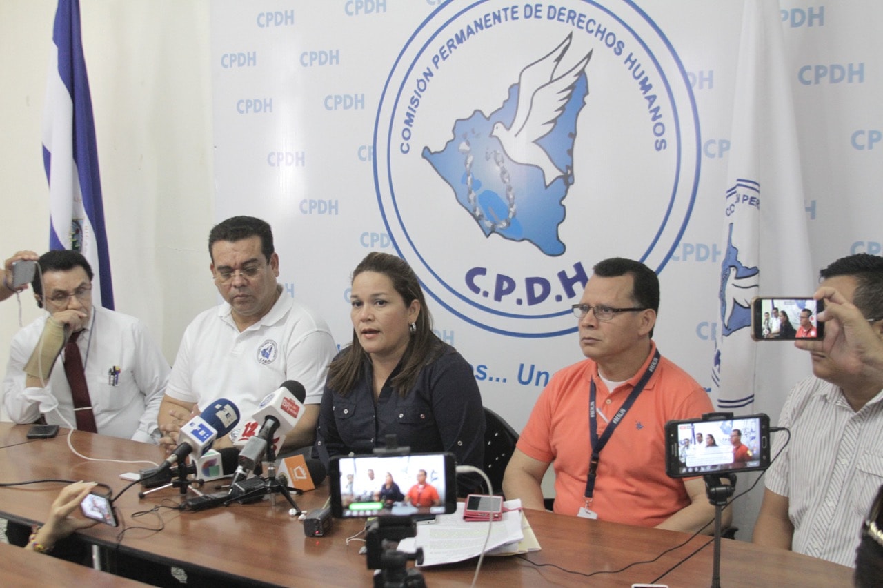 The legal team of the Permanent Human Rights Commission holds a press conference on the cases of Miguel Mora and Lucía Pineda, of 100% Noticias, in Managua, Nicaragua, 24 December 2018, MAYNOR VALENZUELA/AFP/Getty Images