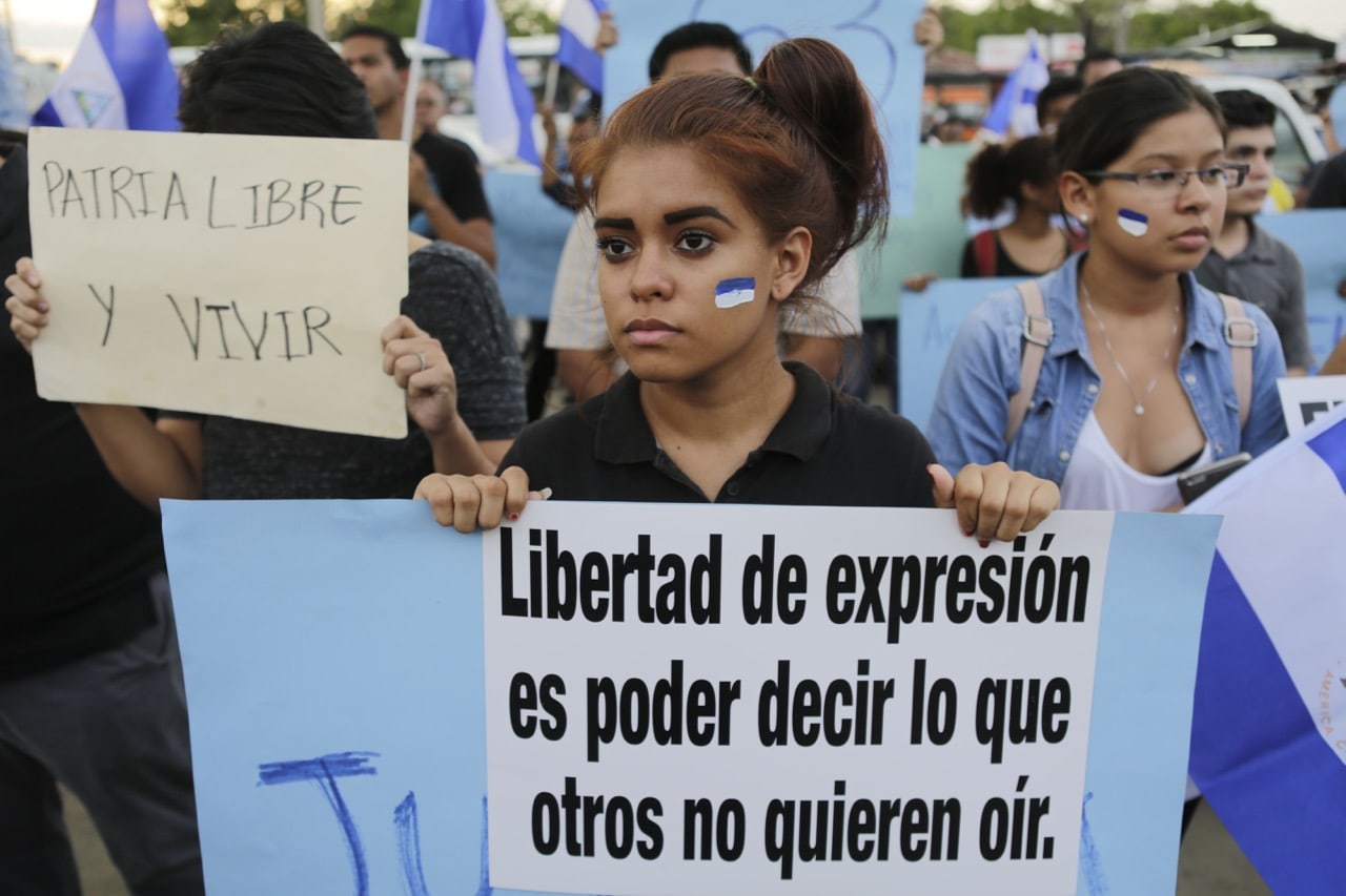 Students and journalists protest in memory of murdered journalist Angel Gaona in front of the Universidad Centroamericana (UCA) in Managua, Nicaragua, 26 April 2018, INTI OCON/AFP/Getty Images