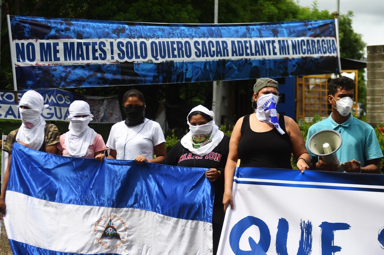 Leaders of anti-government demonstrators hold a press conference to denounce the use of excessive force by the police and paramilitary against protesters, in Managua, Nicaragua, 27 June 2018, MARVIN RECINOS/AFP/Getty Images