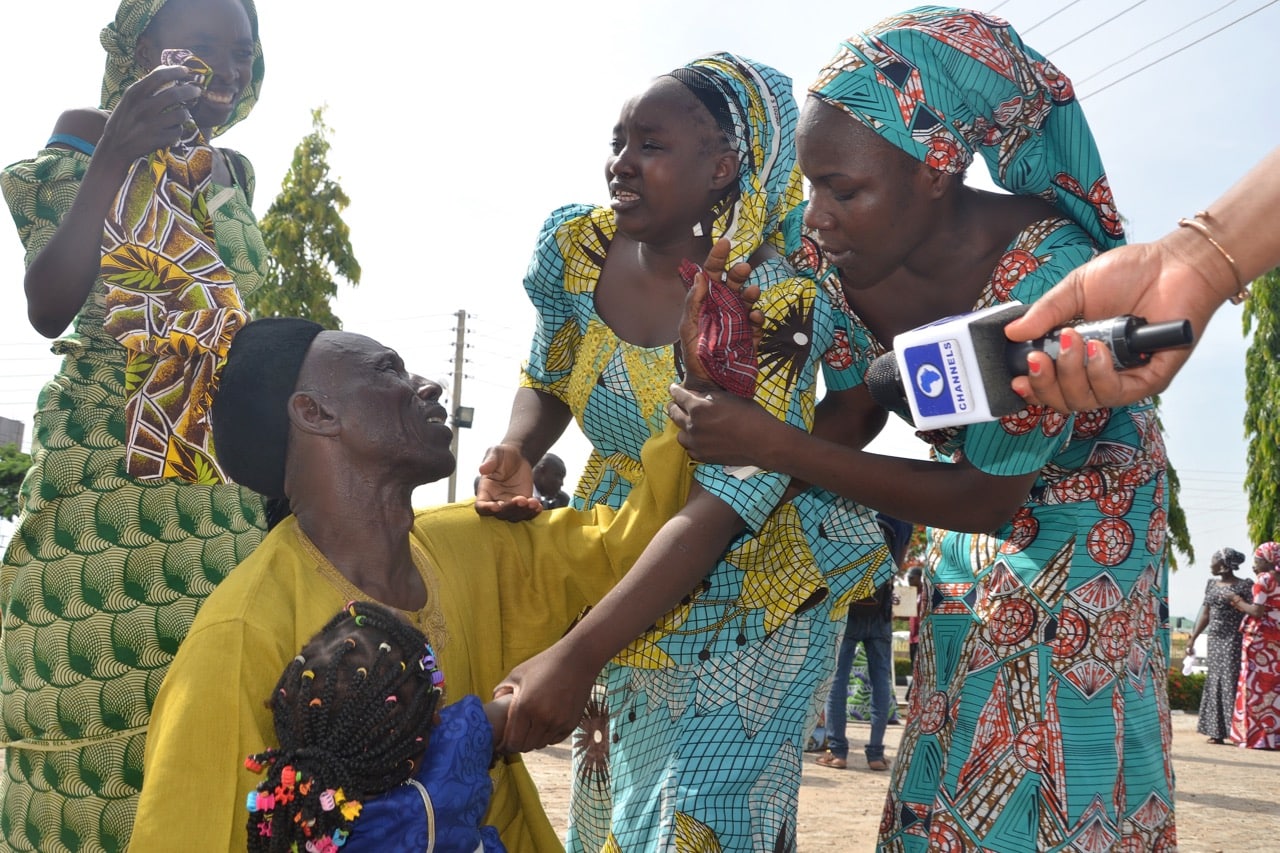 Relatives rejoice after the release of the 82 school girls who had been kidnapped by Boko Haram, in Abuja, Nigeria, 20 May 2017, Sodiq Adelakun/Anadolu Agency/Getty Images