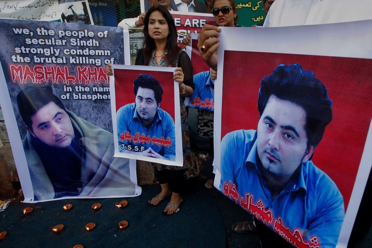 In this 22 April 2017 file photo, members of Pakistani civil society demonstrate against the killing of Mashal Khan, a student at the Abdul Wali Khan University in the northwestern city of Mardan, in Karachi, AP Photo/Fareed Khan, File