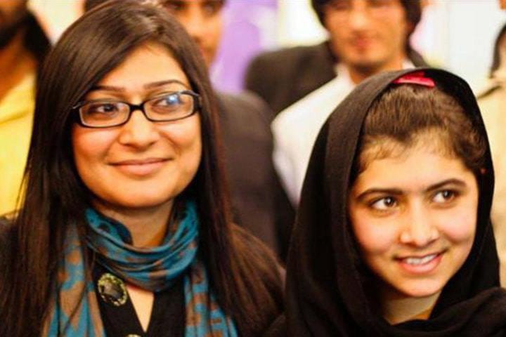 Malala Yousafzai, a Pakistani activist for female education and Nobel Prize laureate, is pictured with Nighat during one of Nighat's workshops in Peshawar in 2011, Mohammad Uzair