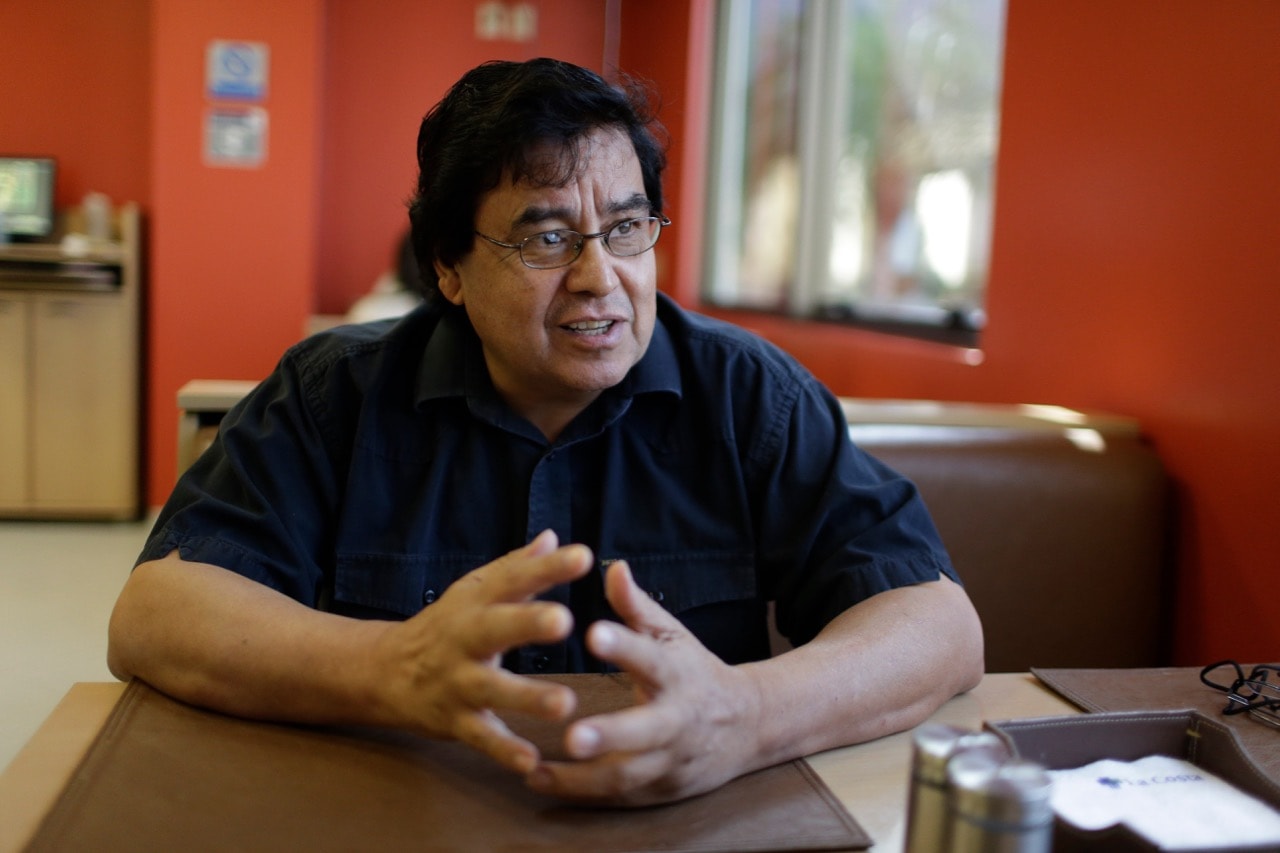 Cándido Figueredo, border-beat reporter for the Paraguayan newspaper ABC Color, speaks during an interview, in Asuncion, Paraguay, 15 September 2015, AP Photo/Jorge Saenz