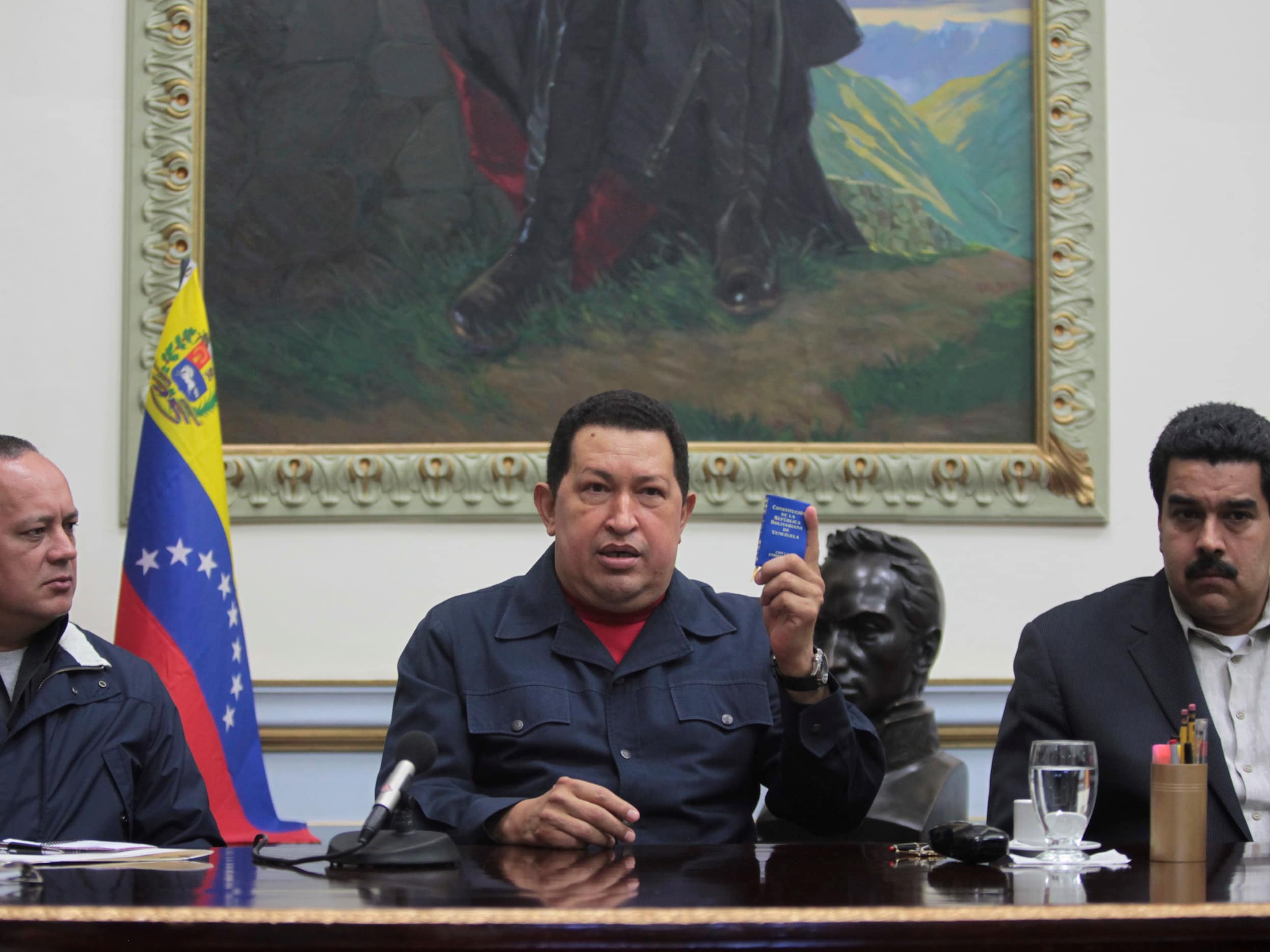 Venezuelan President Hugo Chávez speaks next to Vice President Nicolas Maduro (R) and National assembly president Diosdado Cabello (L) during a national broadcast at Miraflores Palace in Caracas December 8, 2012, REUTERS/Miraflores Palace/Handout