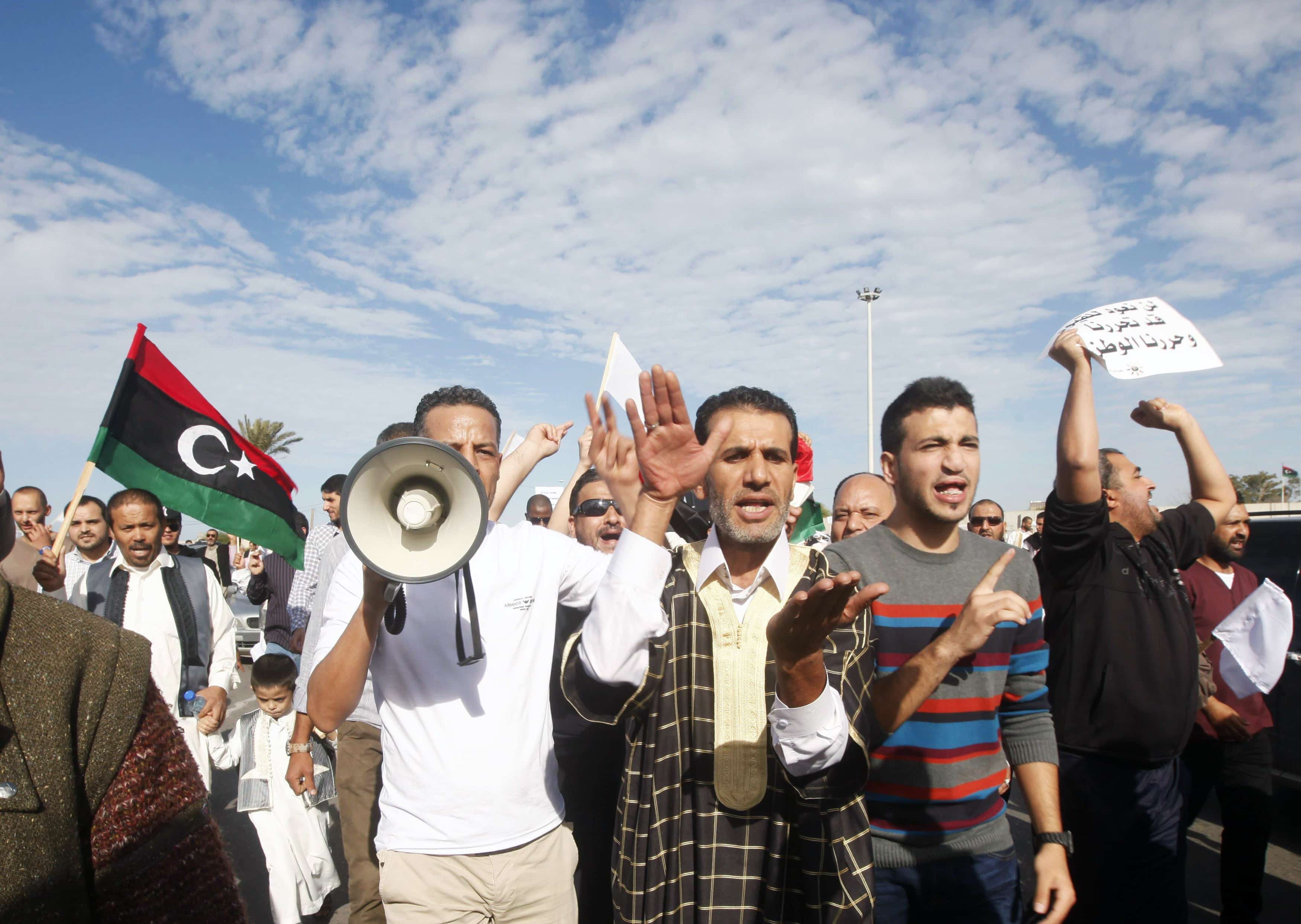 Protesters march during a demonstration calling on militiamen to leave, in Tripoli on 15 November 2013, REUTERS/Ismail Zitouny