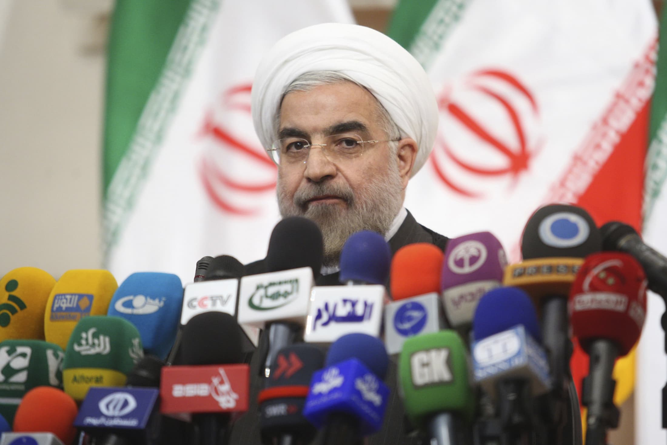 Iranian President Hassan Rouhani speaks with the media during a news conference in Tehran on 17 June 2013, REUTERS/Fars News/Majid Hagdost