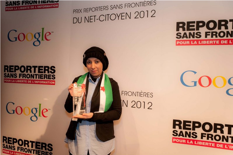 Syrian activist Jasmine accepted the prize on behalf of activists inside the country, RSF/Christophe Bocquet