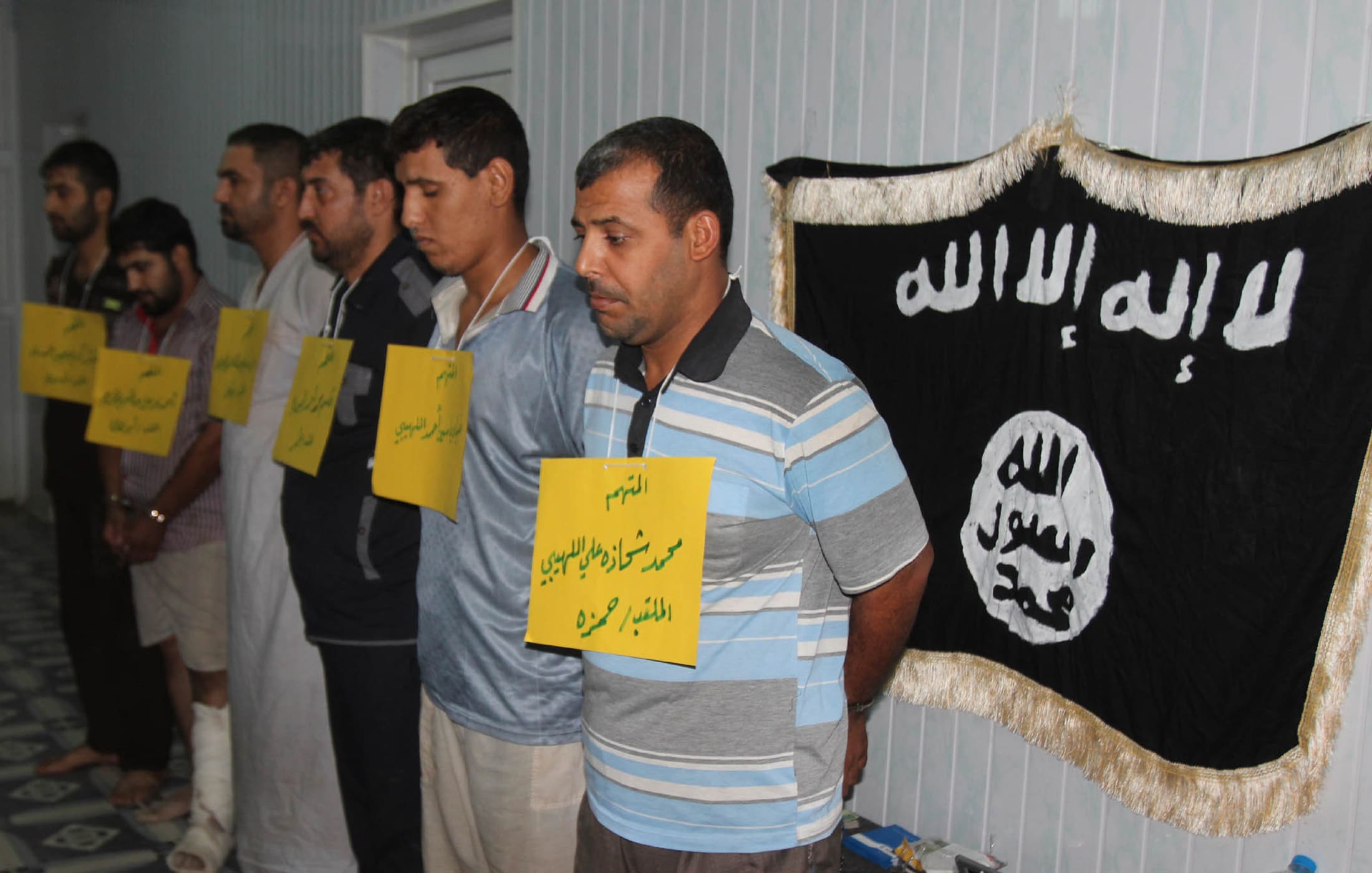 Suspected al-Qaeda militants accused of bomb attacks and armed robbery in Kirkuk, Iraq, REUTERS/Ako Rasheed