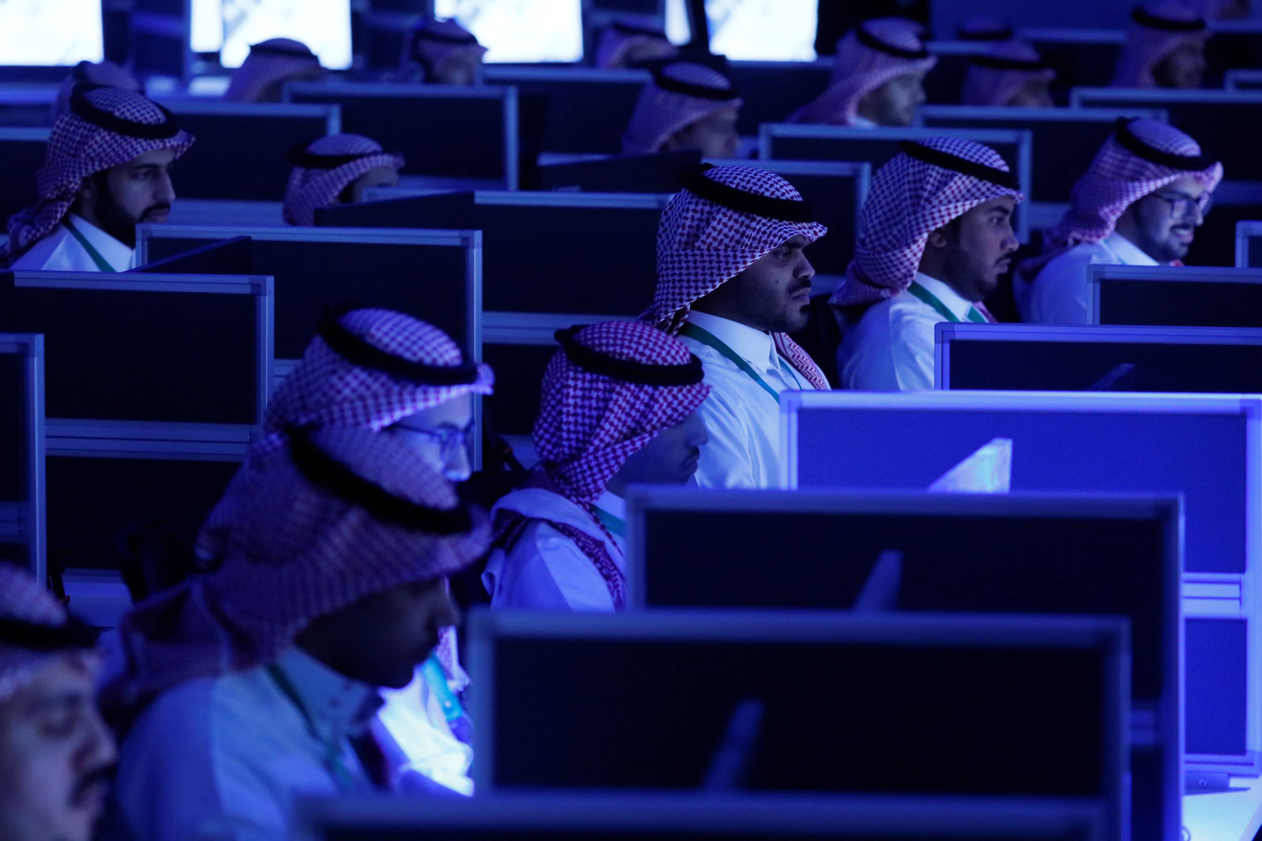 Data collectors sit at screens in the new Global Center for Combatting Extremist Ideology in Riyadh, Saudi Arabia, 21 May 2017, REUTERS/Jonathan Ernst