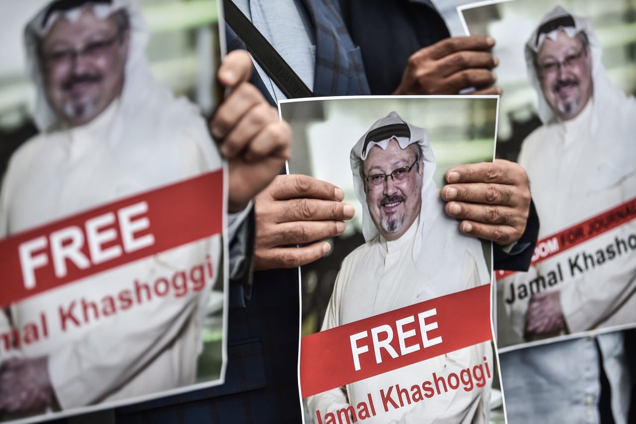 Protestors hold pictures of missing journalist Jamal Khashoggi during a demonstration in front of the Saudi Arabian consulate on 8 October 2018 in Istanbul, Turkey, OZAN KOSE/AFP/Getty Images