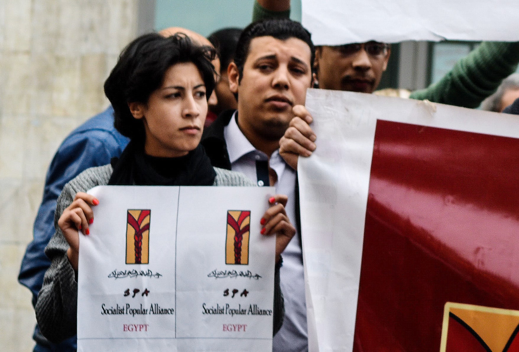 In this Jan. 24, 2015 photo, 32-year-old mother Shaimaa el-Sabbagh holds a poster during a protest in downtown Cairo, AP Photo/Mohammed El-Raaei, File