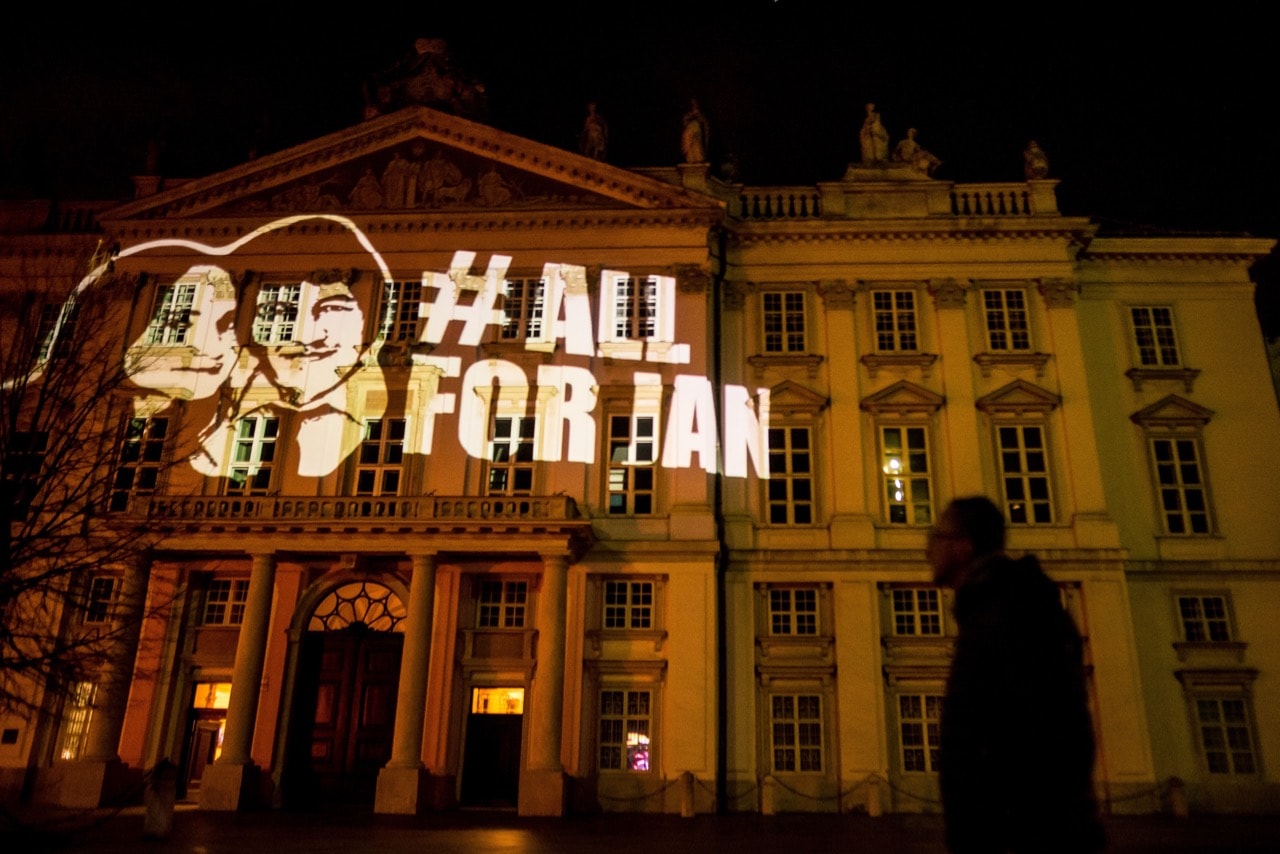 A projection on the facade of the city hall shows the portraits of murdered journalist Ján Kuciak and his fiancee Martina Kusnirova, in Bratislava, Slovakia, 20 February 2019, VLADIMIR SIMICEK/AFP/Getty Images