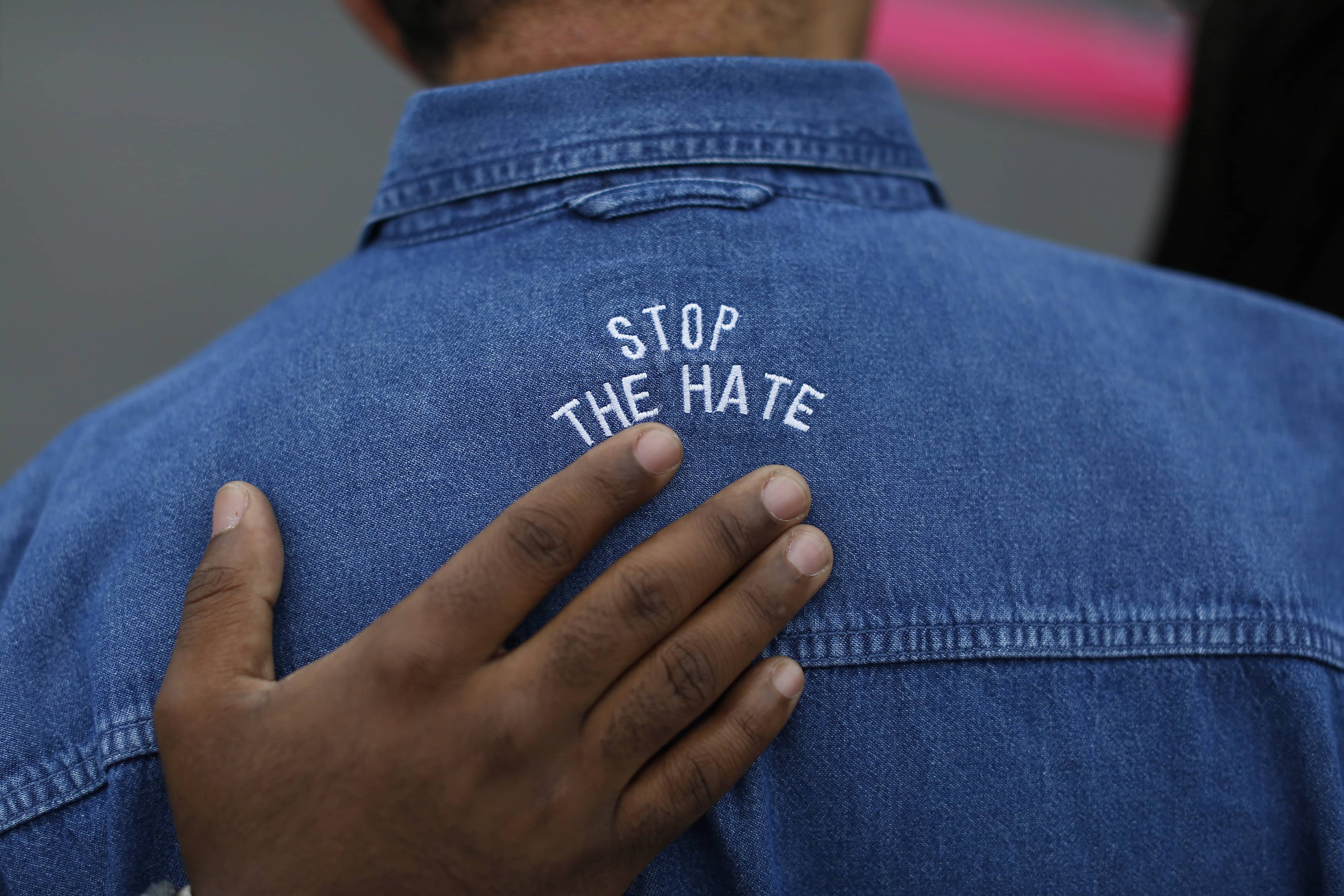 A protester is seen wearing a stitched slogan "stop the hate" on the back of his shirt during a peaceful protest against police violence organized by the San Francisco LGBT Community Center in San Francisco, California December 24, 2014, REUTERS/Stephen Lam