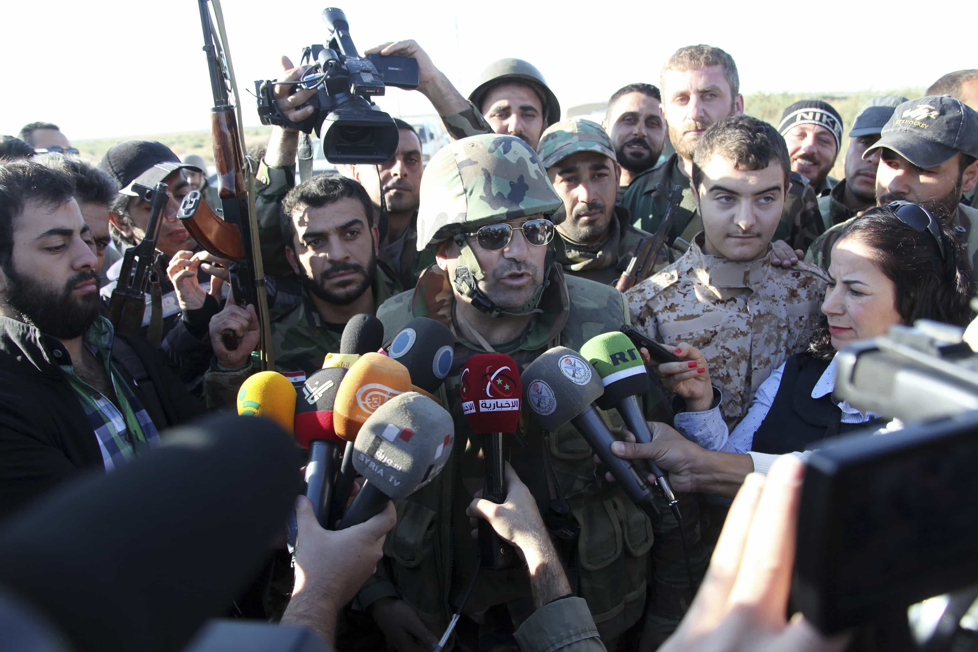 A field commander loyal to Syria's President Bashar al-Assad talks to media at the eastern Ghouta near Damascus, REUTERS/SANA/Handout via Reuters