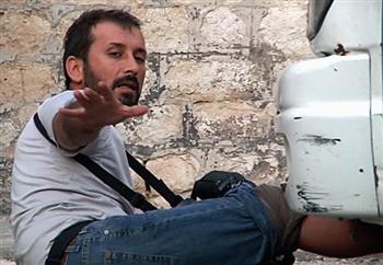 Anadolu photographer Sinan Gul sustained serious leg injuries from sniper fire, Anadolu Ajansi