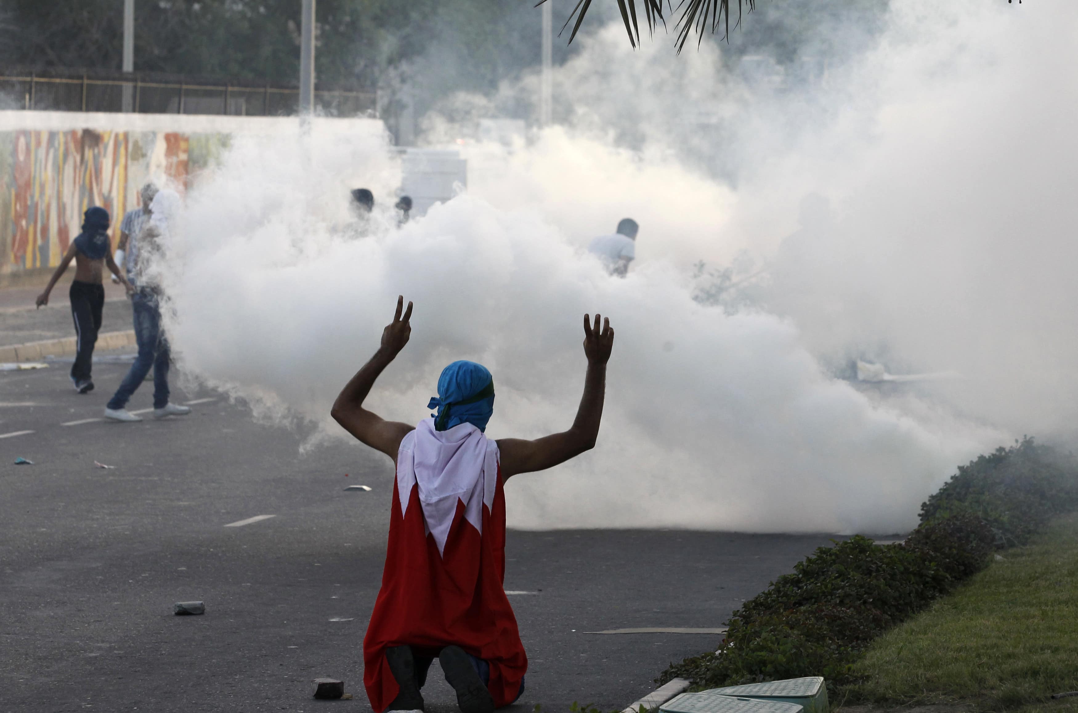 Riot police fire tear gas at protesters in Bahrain in May 2013., REUTERS/Hamad I Mohammed